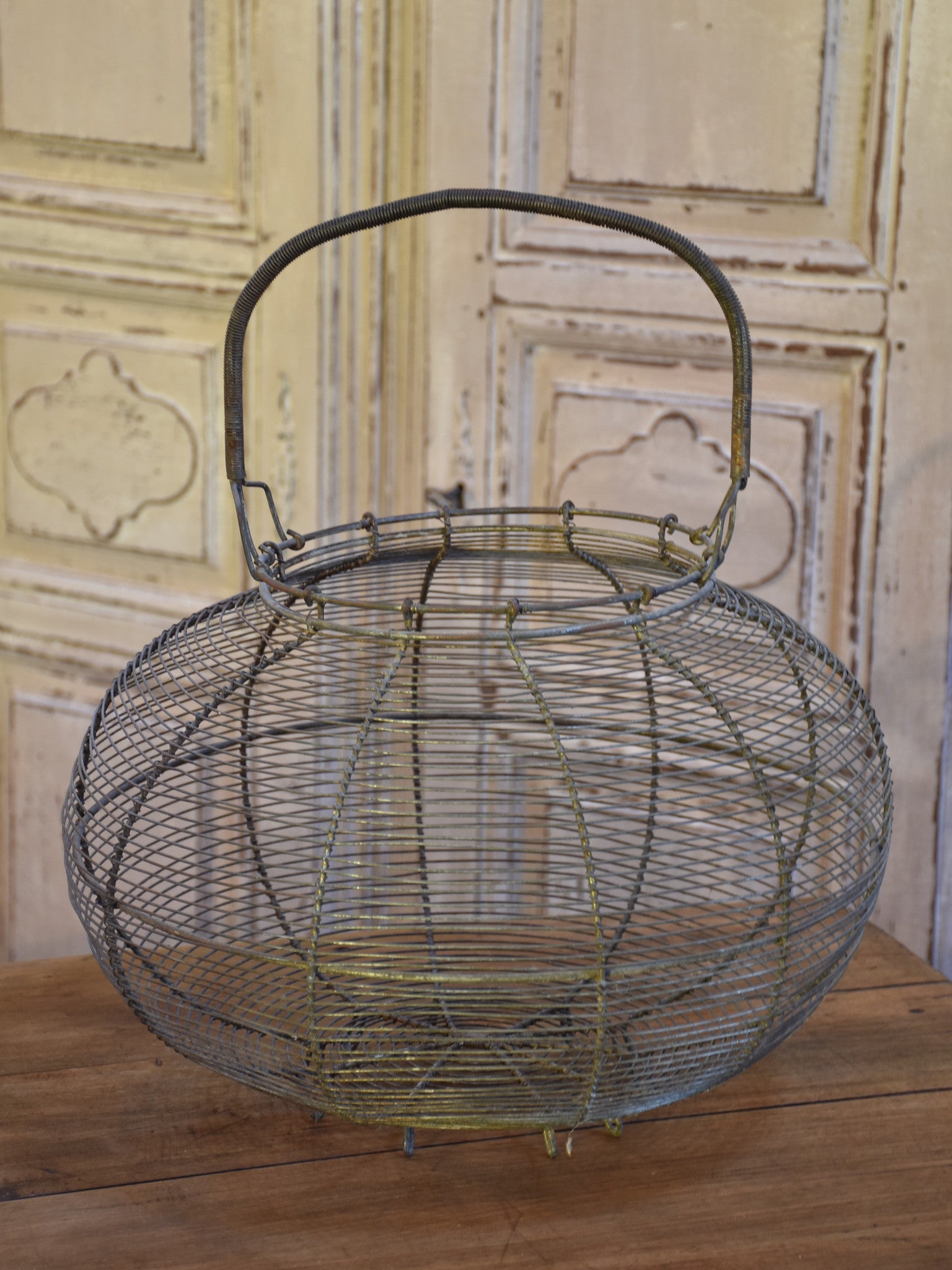 Very large antique wire basket for collecting escargots