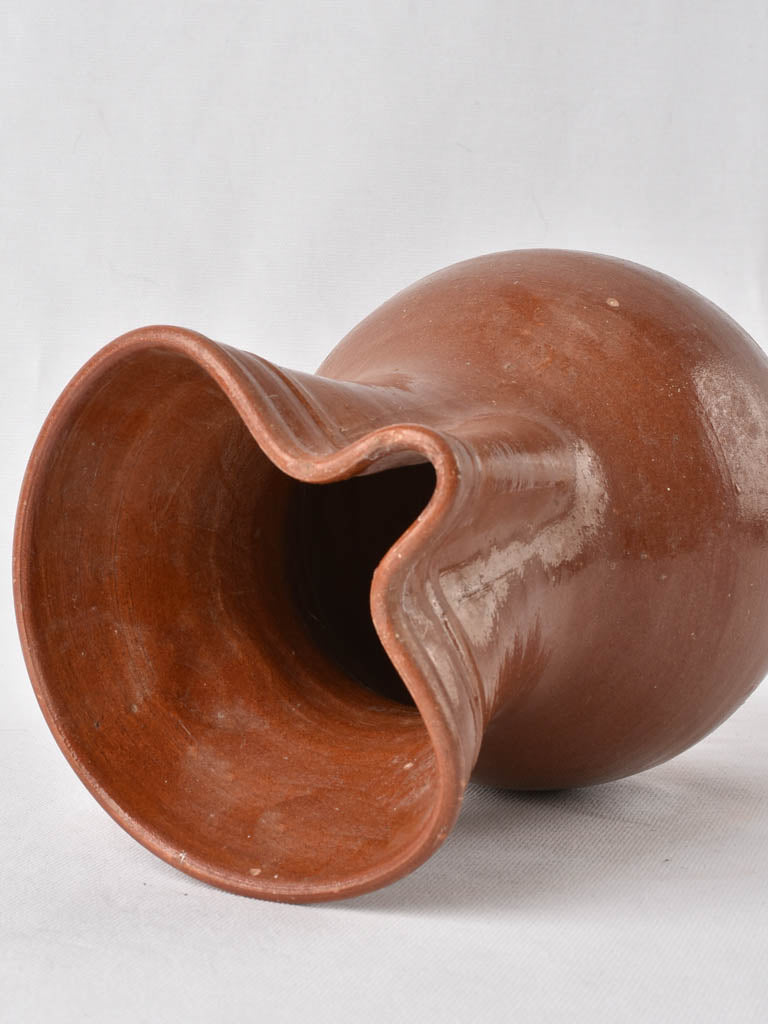 1970s terracotta pitcher w/ brown glaze 9½"