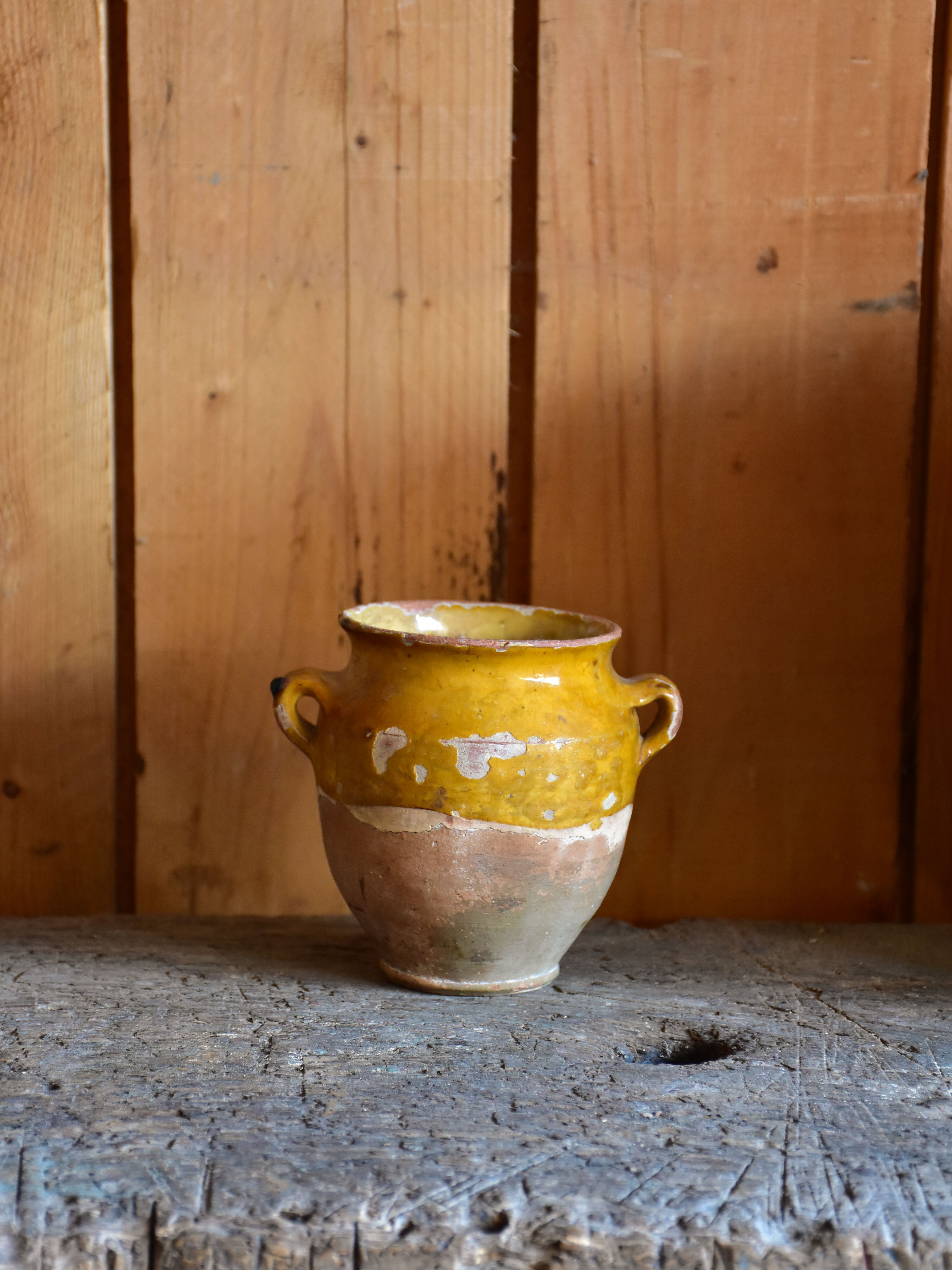 Three antique French confit pots with orange glaze