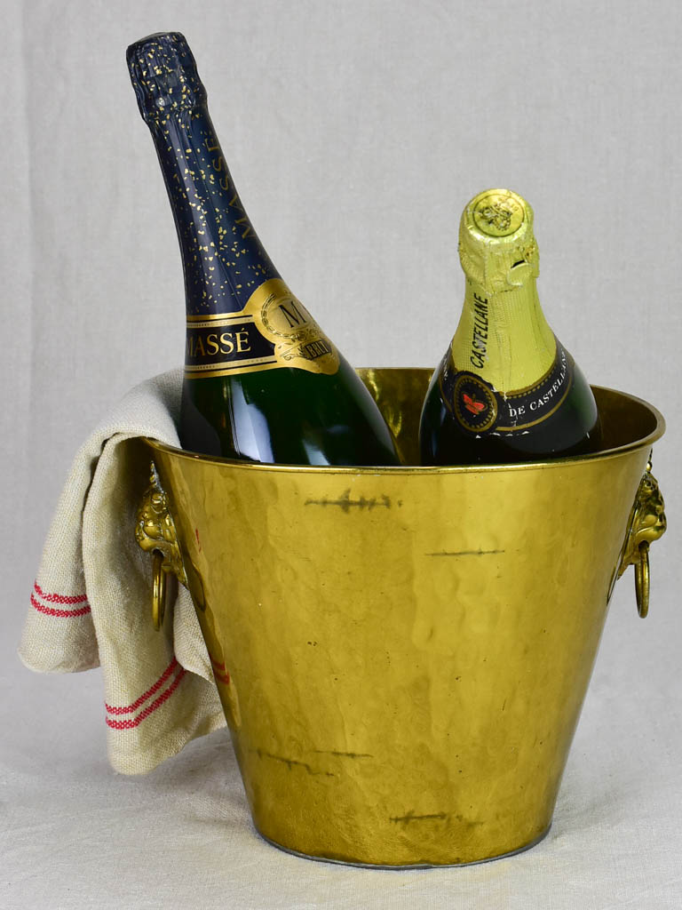 Vintage ice bucket with lions head handles and hammered brass 9¾"