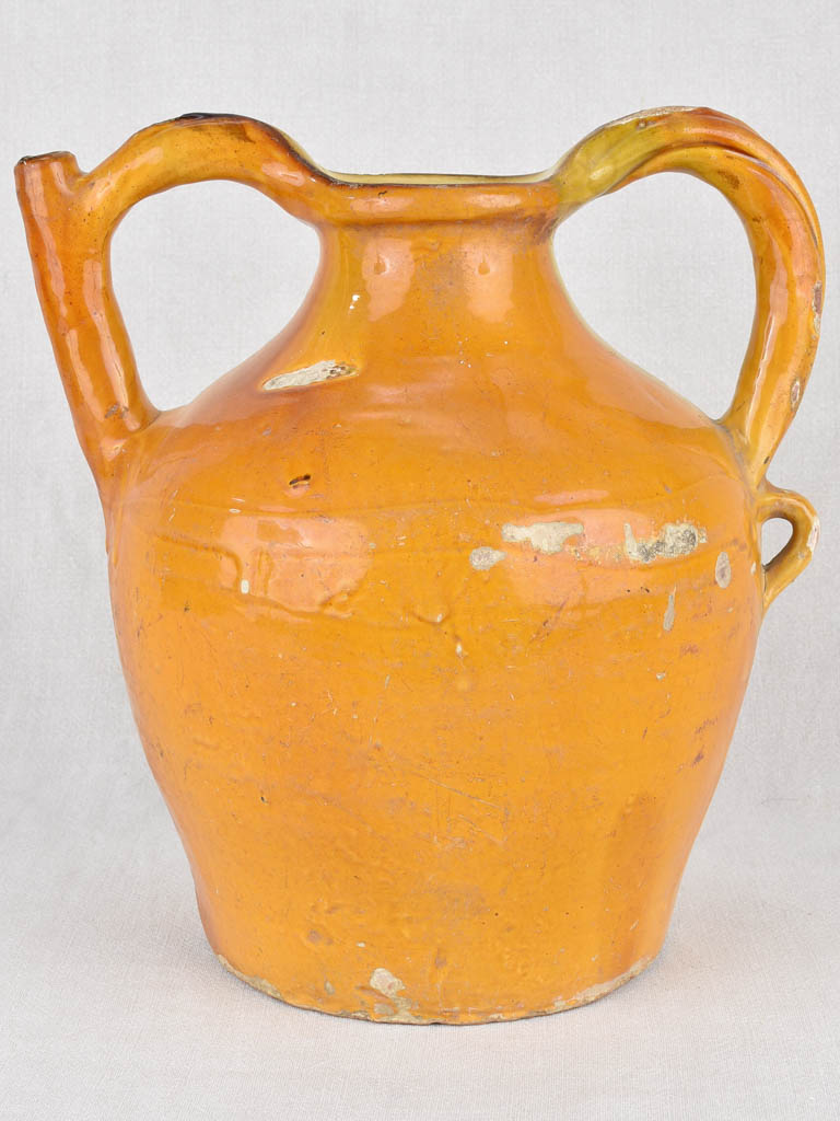 Water pitcher, yellow w/ twisted handles, 19th-century 14¼"