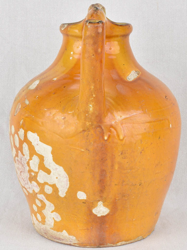 Water pitcher, yellow w/ twisted handles, 19th-century 14¼"