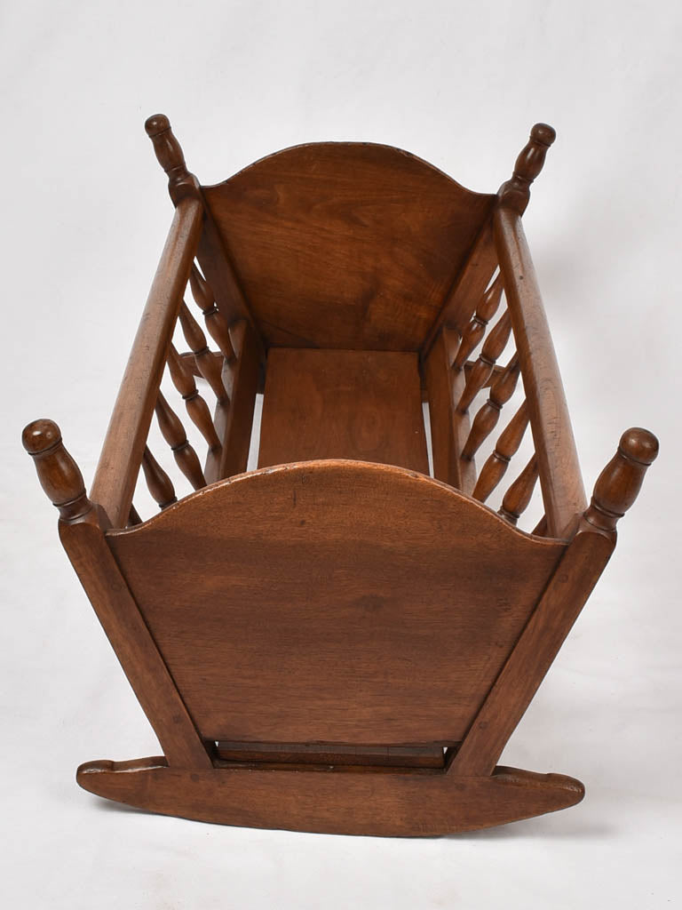 Historic walnut comfort-providing cradle