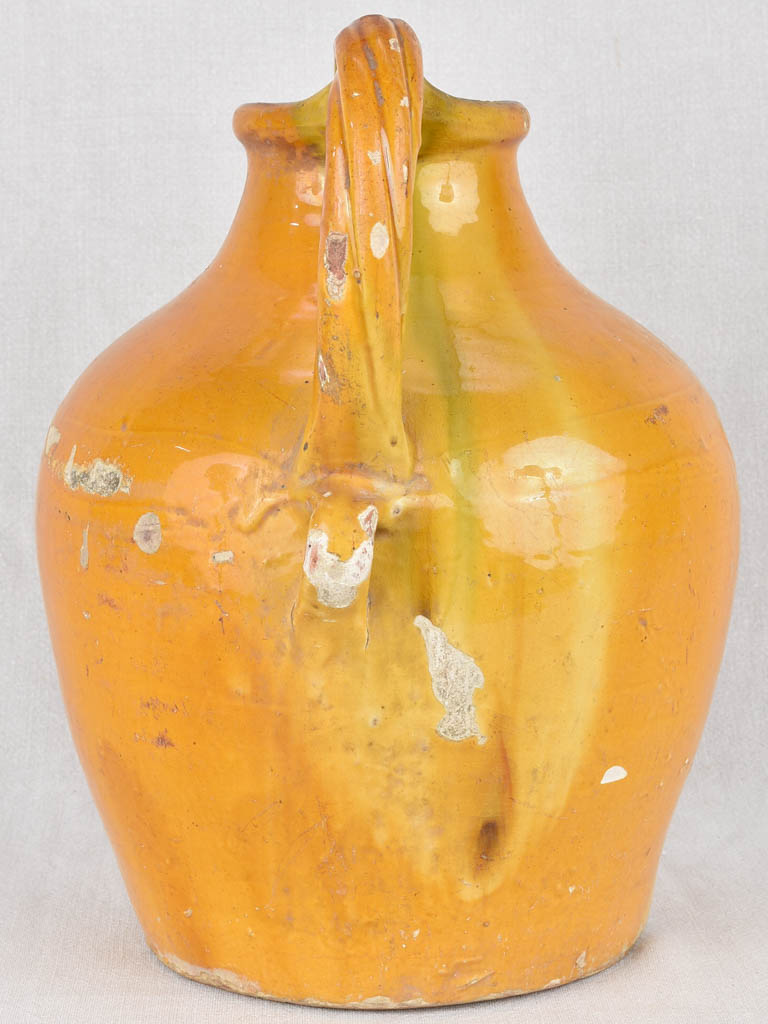 Water pitcher, yellow w/ twisted handles, 19th-century 14¼"