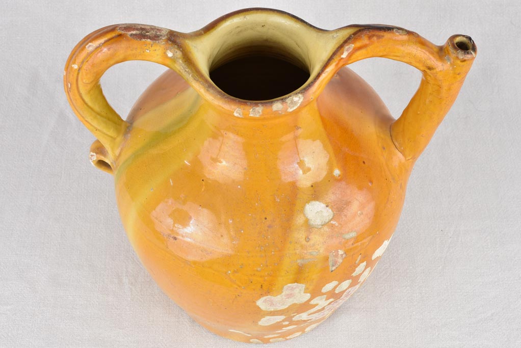 Water pitcher, yellow w/ twisted handles, 19th-century 14¼"