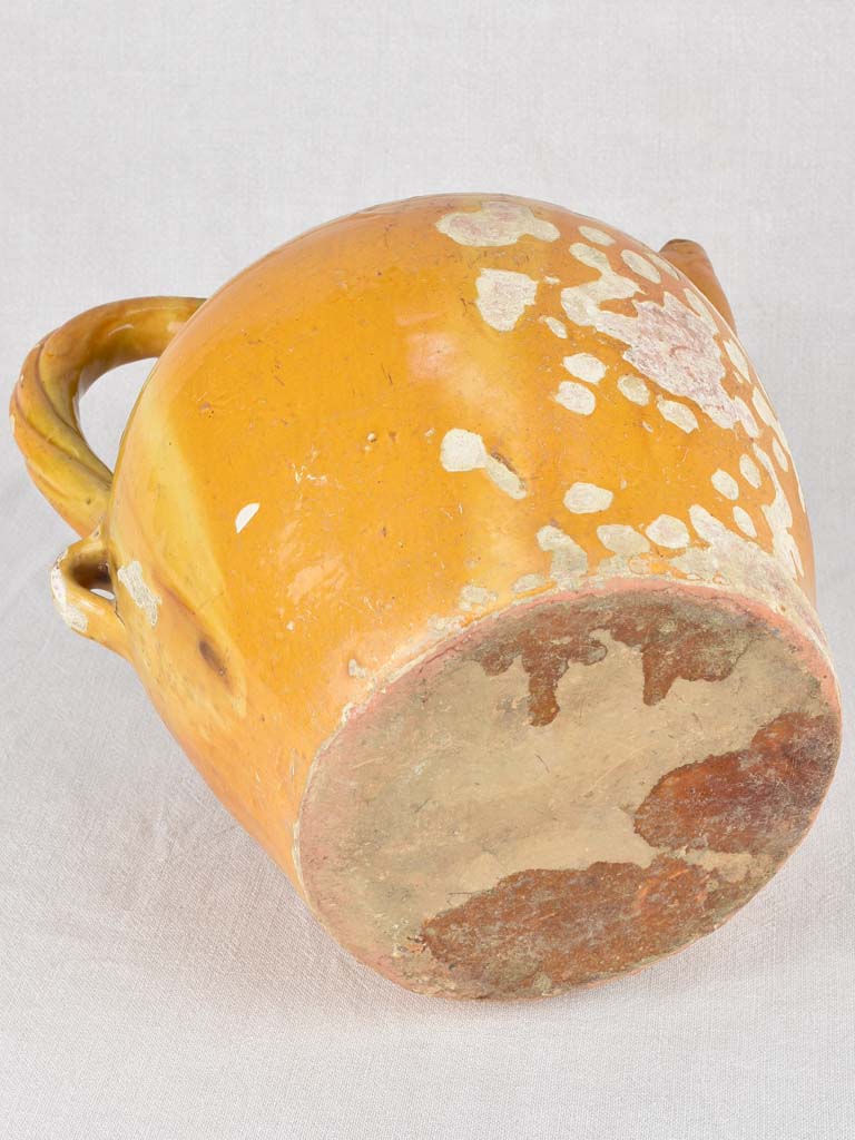 Water pitcher, yellow w/ twisted handles, 19th-century 14¼"