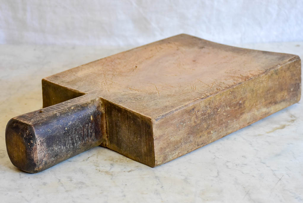 Very chunky antique French cutting board with rectangular handle 8¾" x 16¼"