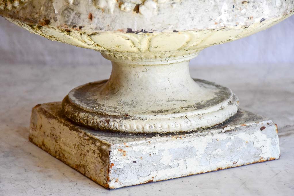 19th Century French cast iron urn with medallion and garlands - white 17¾"