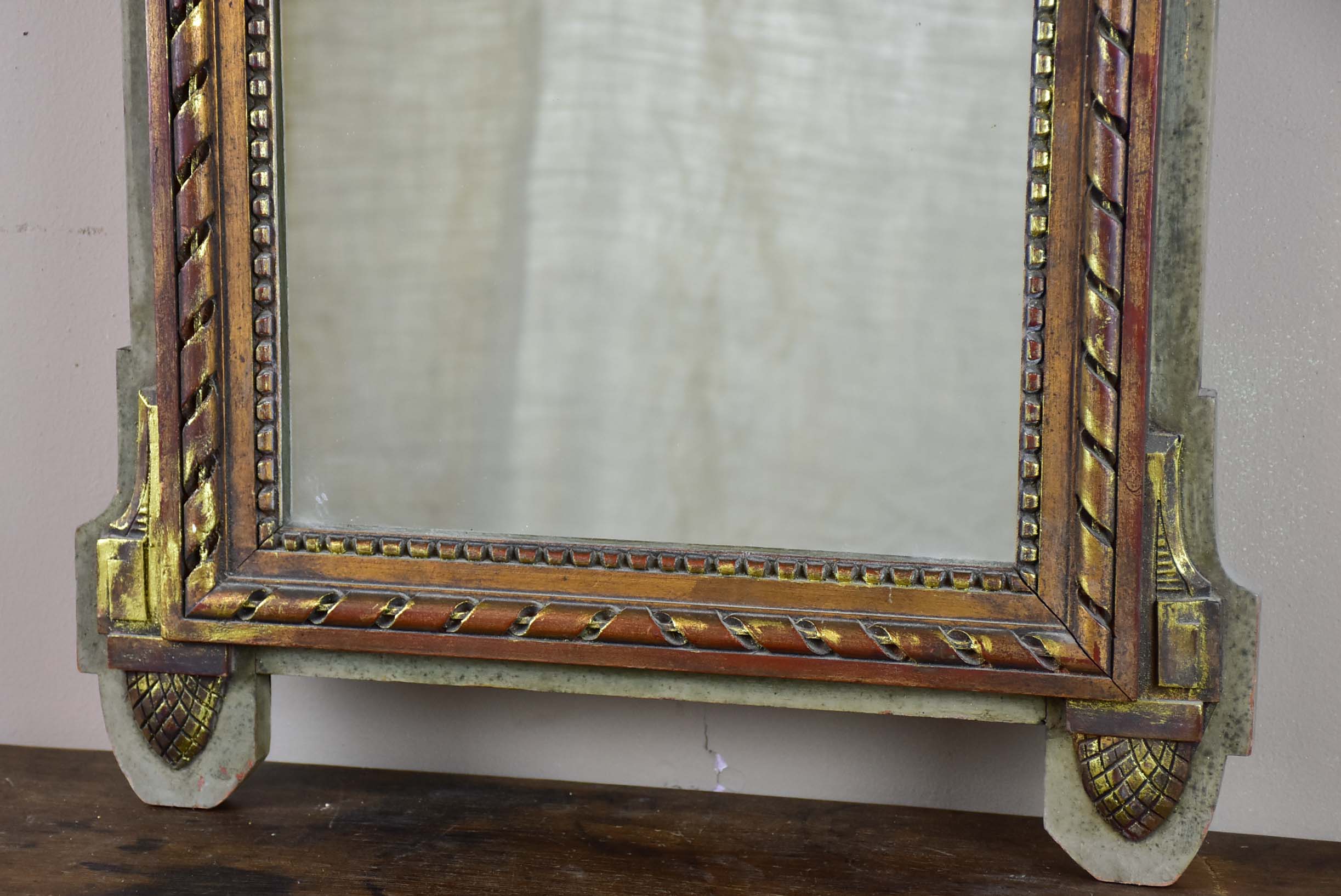 19th century Louis XVI style mirror with crest 19 ¼'' x 34 ¾''