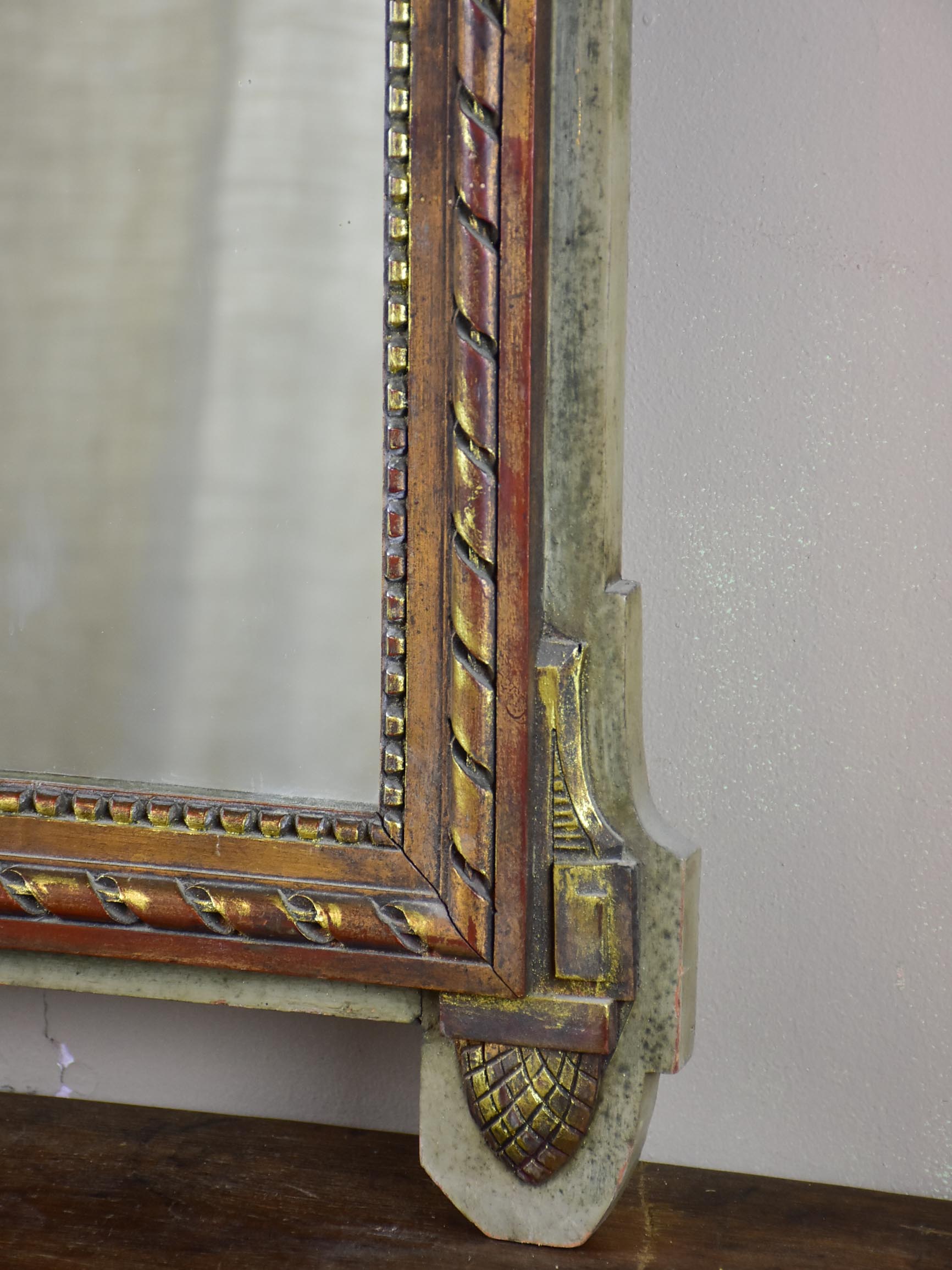 19th century Louis XVI style mirror with crest 19 ¼'' x 34 ¾''