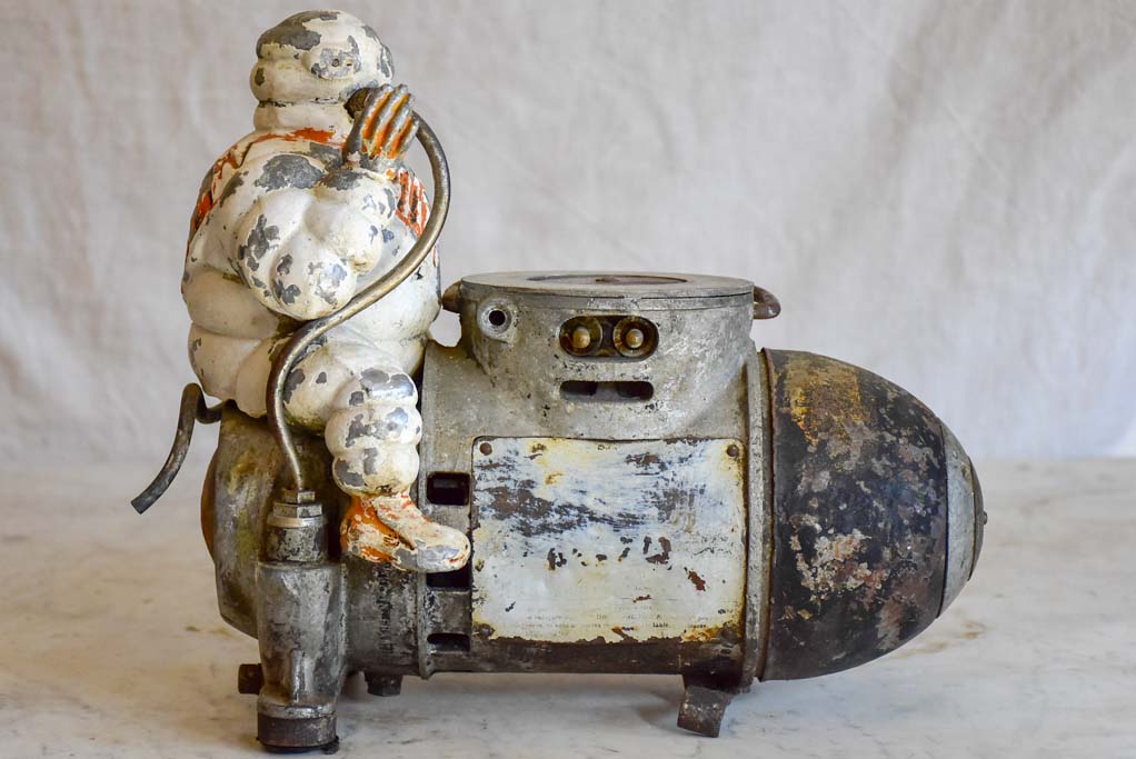 Early 20th Century French Michelin man air compressor