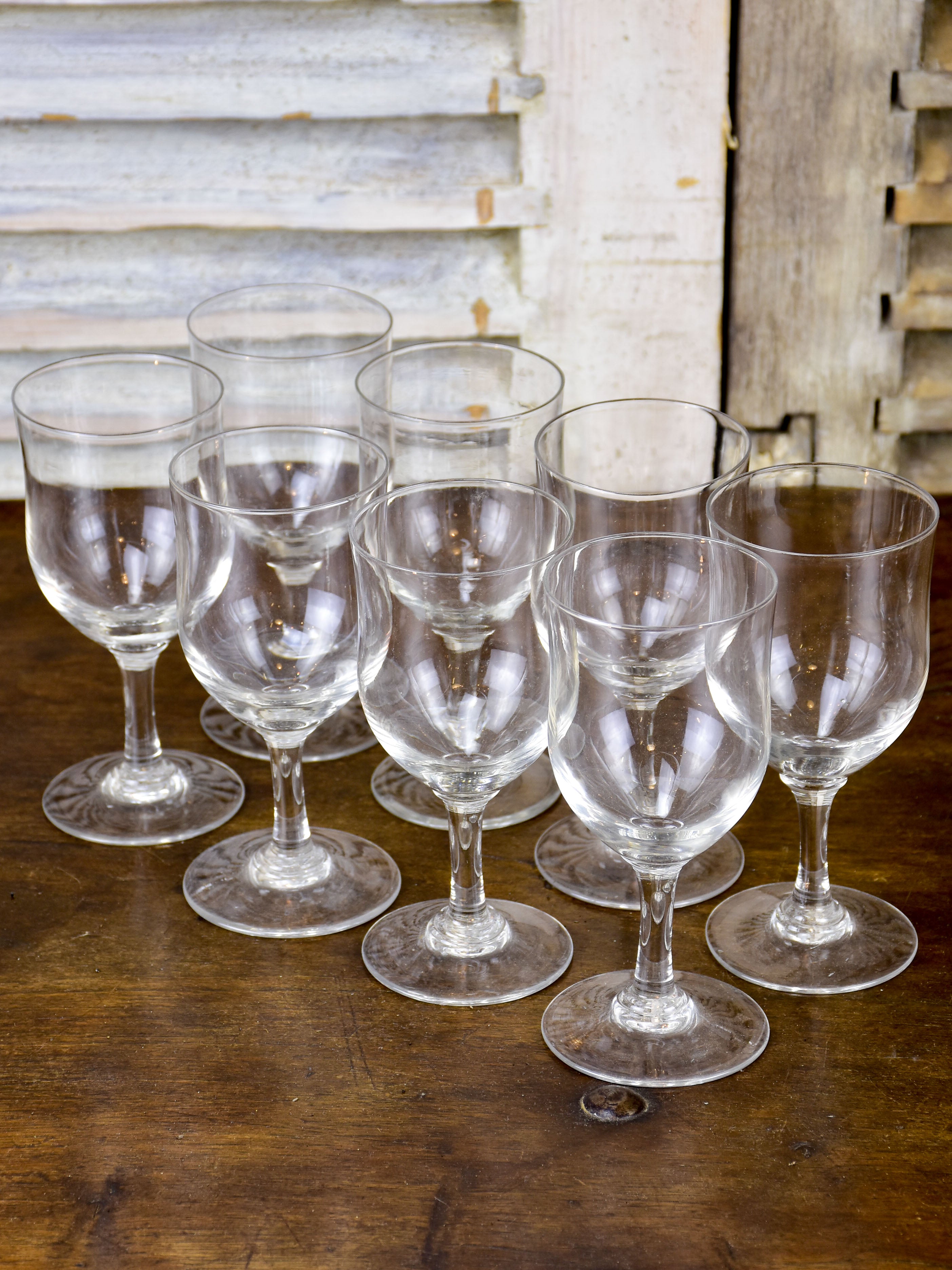 Set of eight antique bistro wine glasses