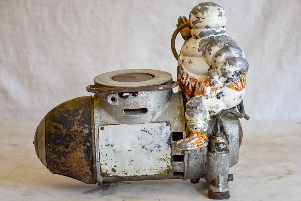 Early 20th Century French Michelin man air compressor