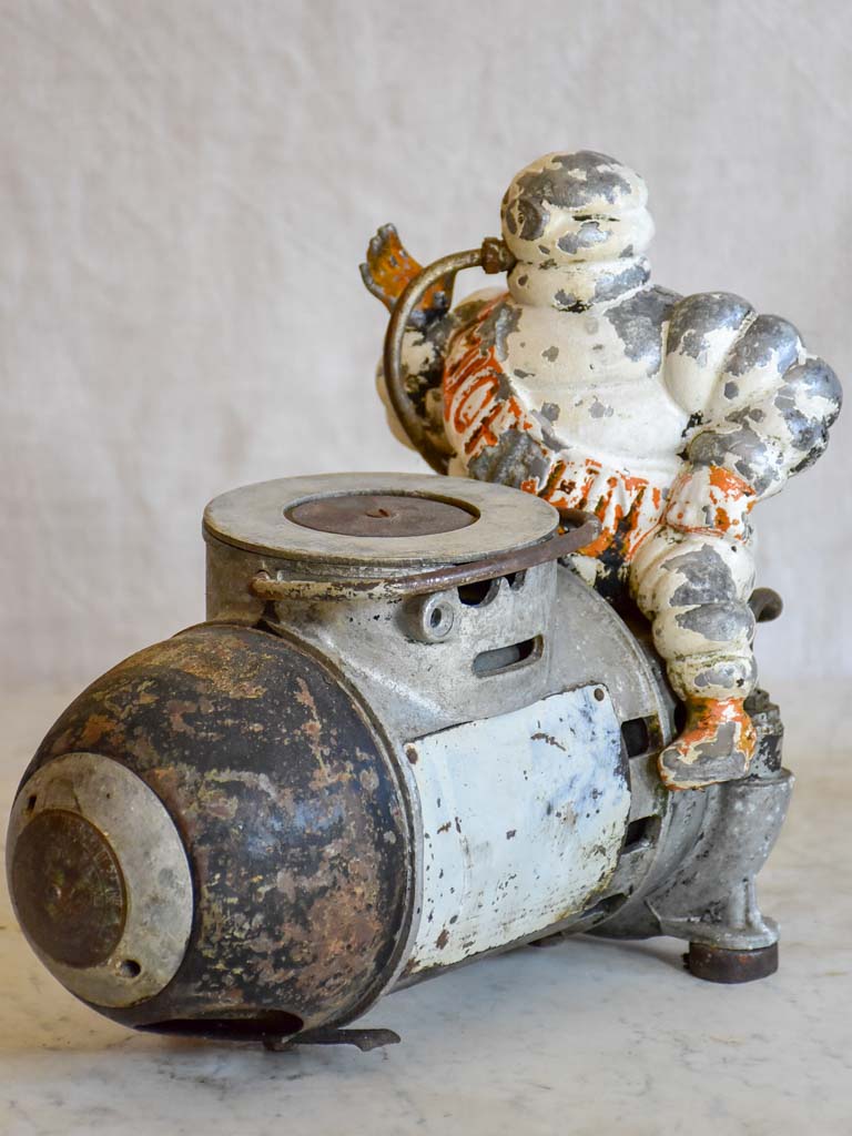 Early 20th Century French Michelin man air compressor