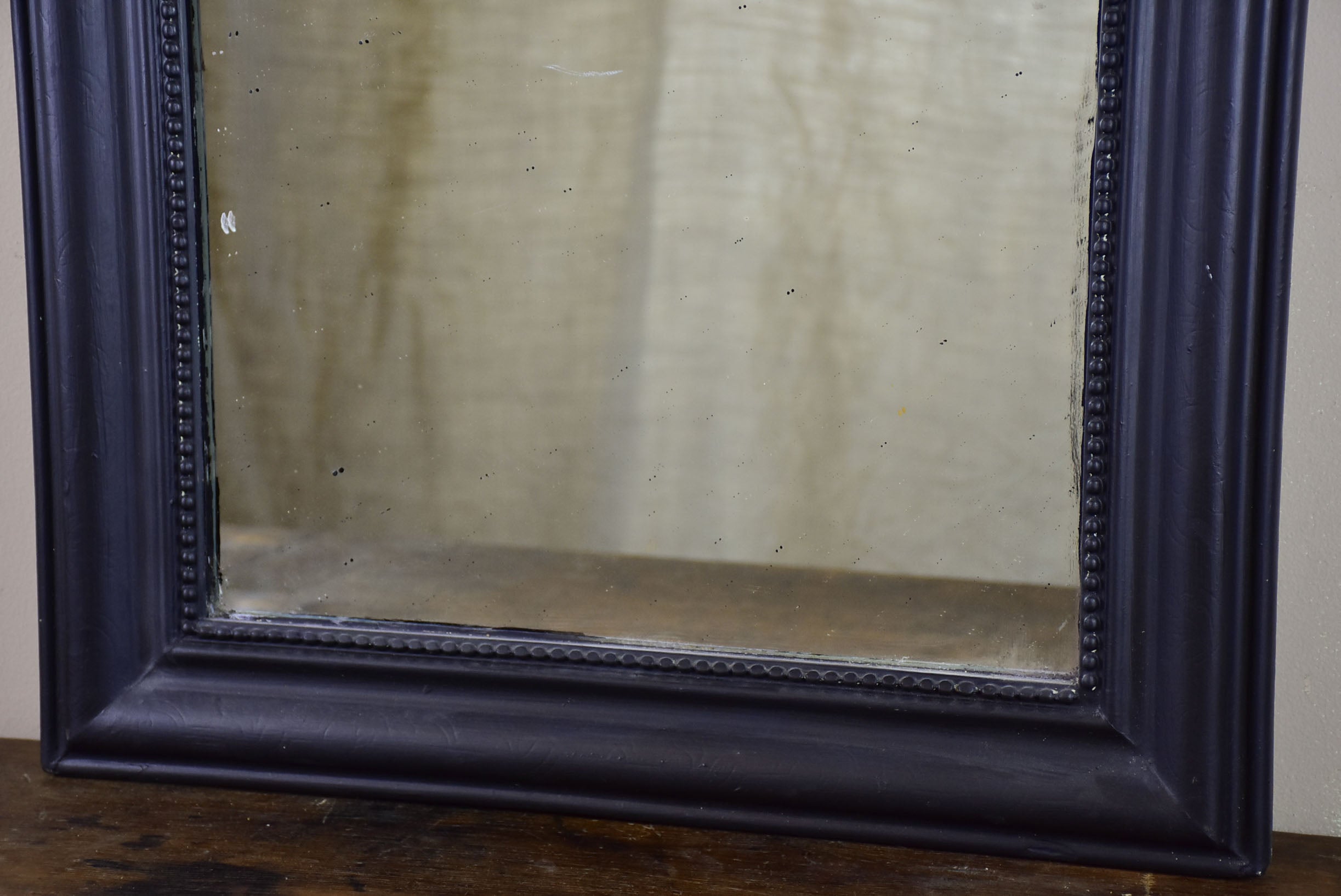 Small antique French Louis Philippe mirror with black frame 22” x 29”