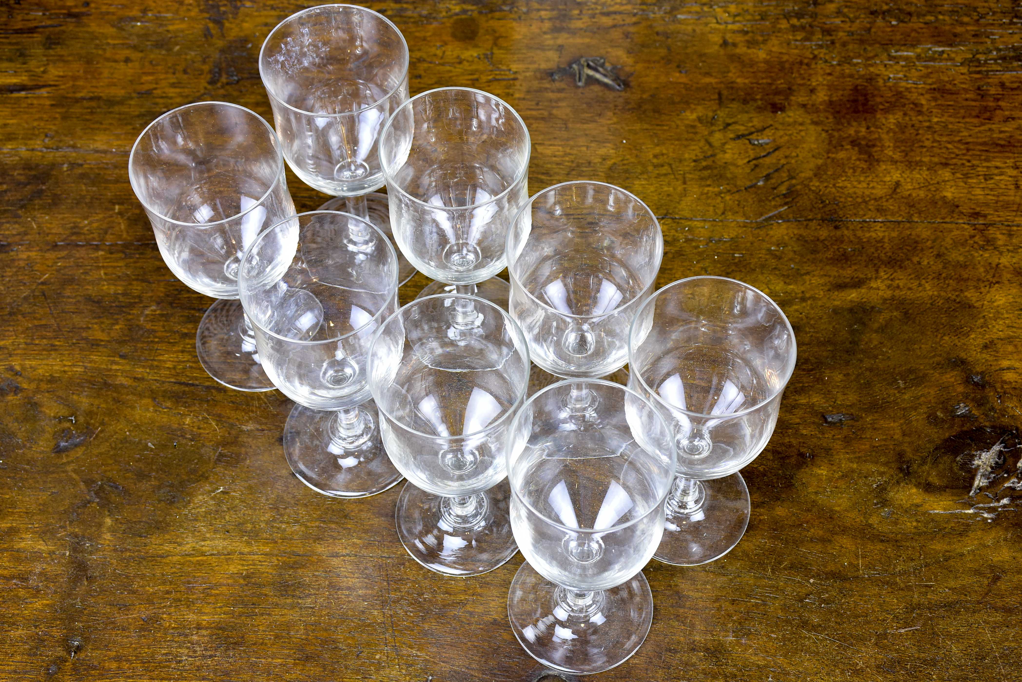 Set of eight antique bistro wine glasses