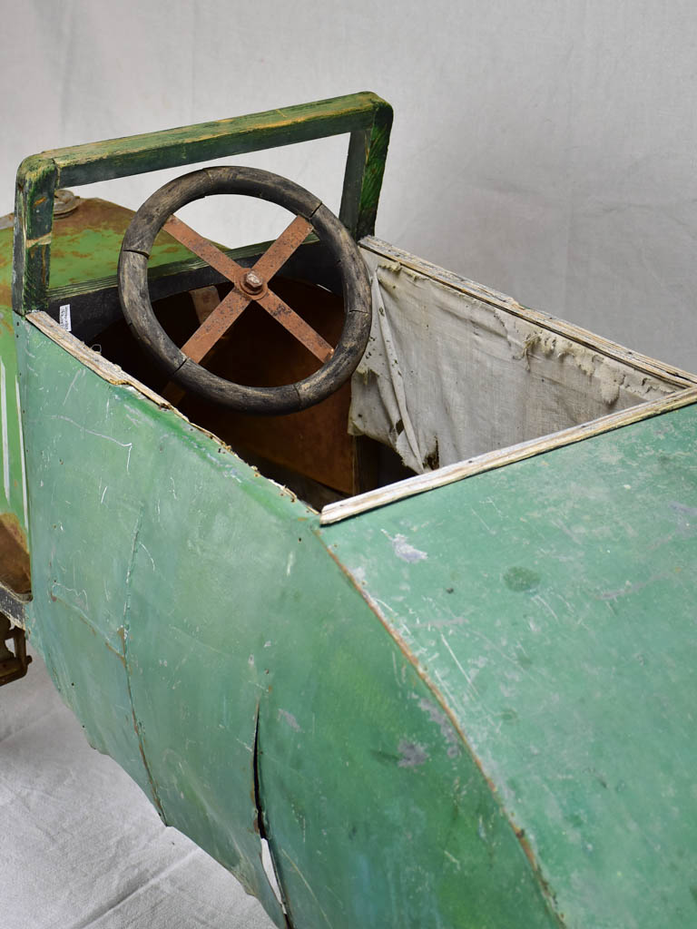 Rare green toy push car from the mid-twentieth century 61"