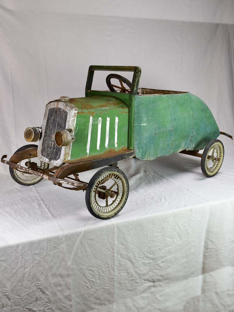 Rare green toy push car from the mid-twentieth century 61"