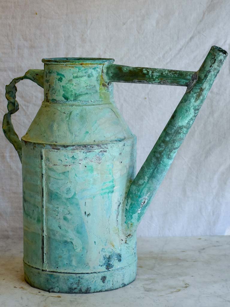 Antique French copper watering can with aqua blue patina