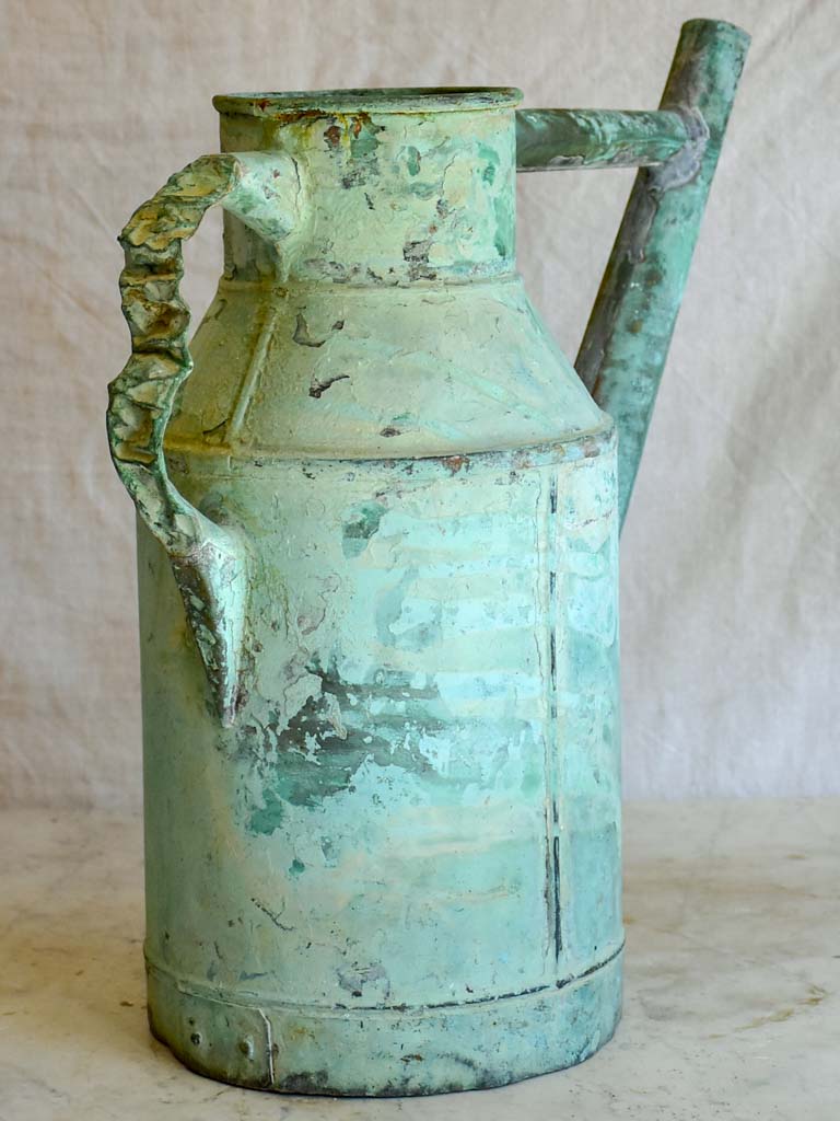 Antique French copper watering can with aqua blue patina