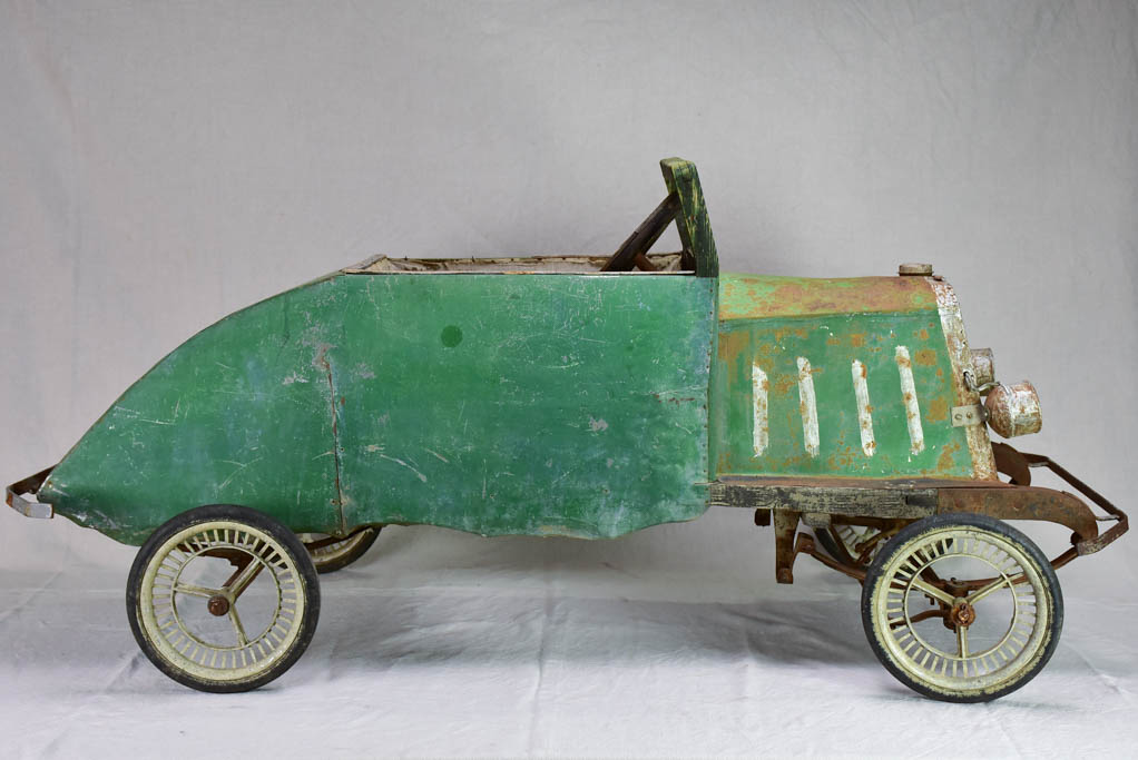 Rare green toy push car from the mid-twentieth century 61"