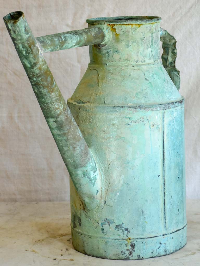 Antique French copper watering can with aqua blue patina