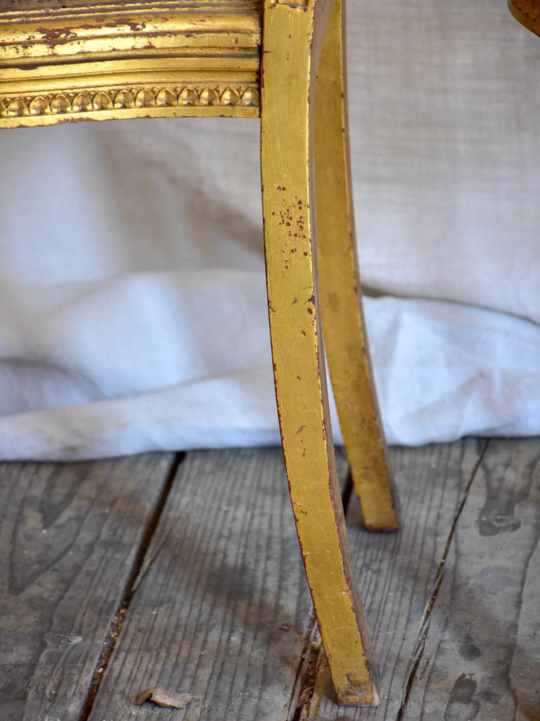 Pair of 18th Century Louis XVI gilded cane chairs