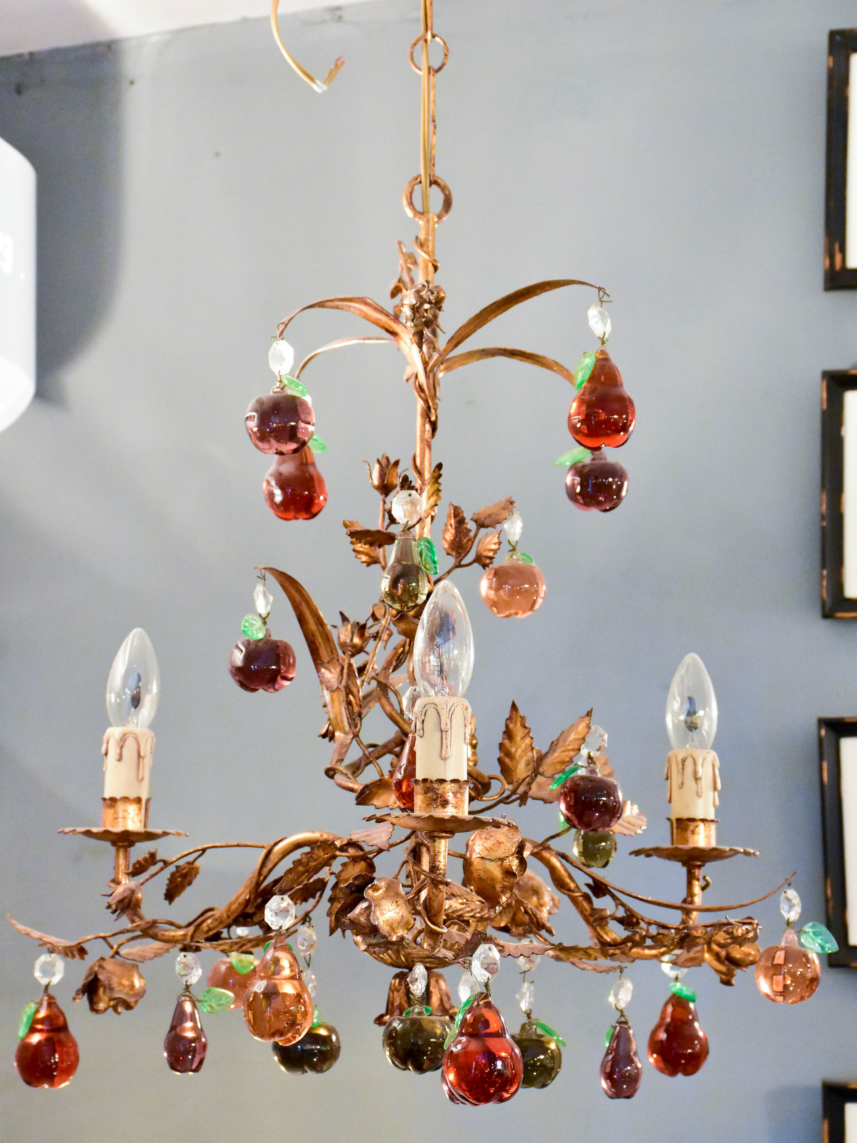 Vintage Italian chandelier with Murano glass fruits and a decorative gilded frame