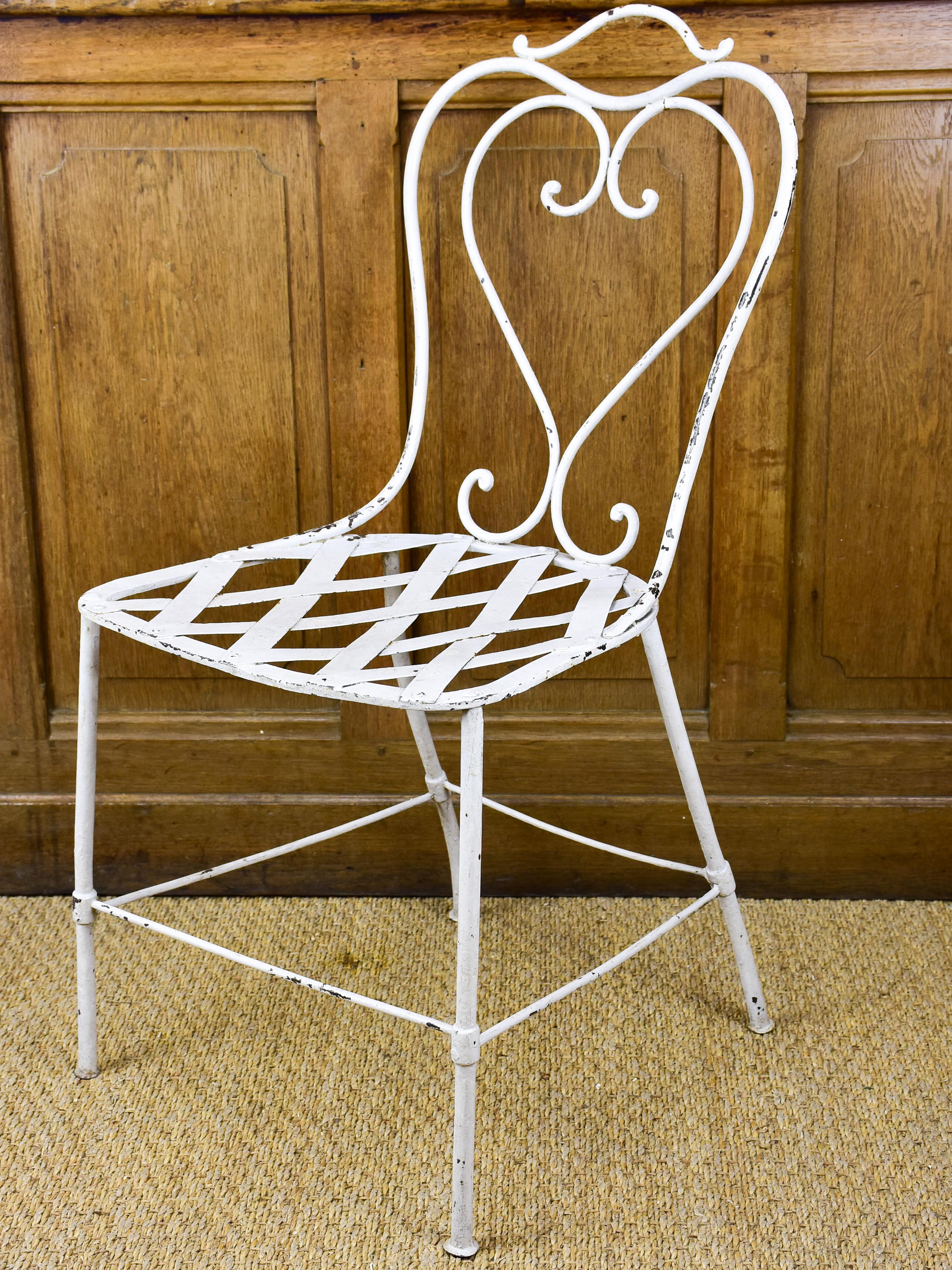 Antique French garden chair with heart backrest