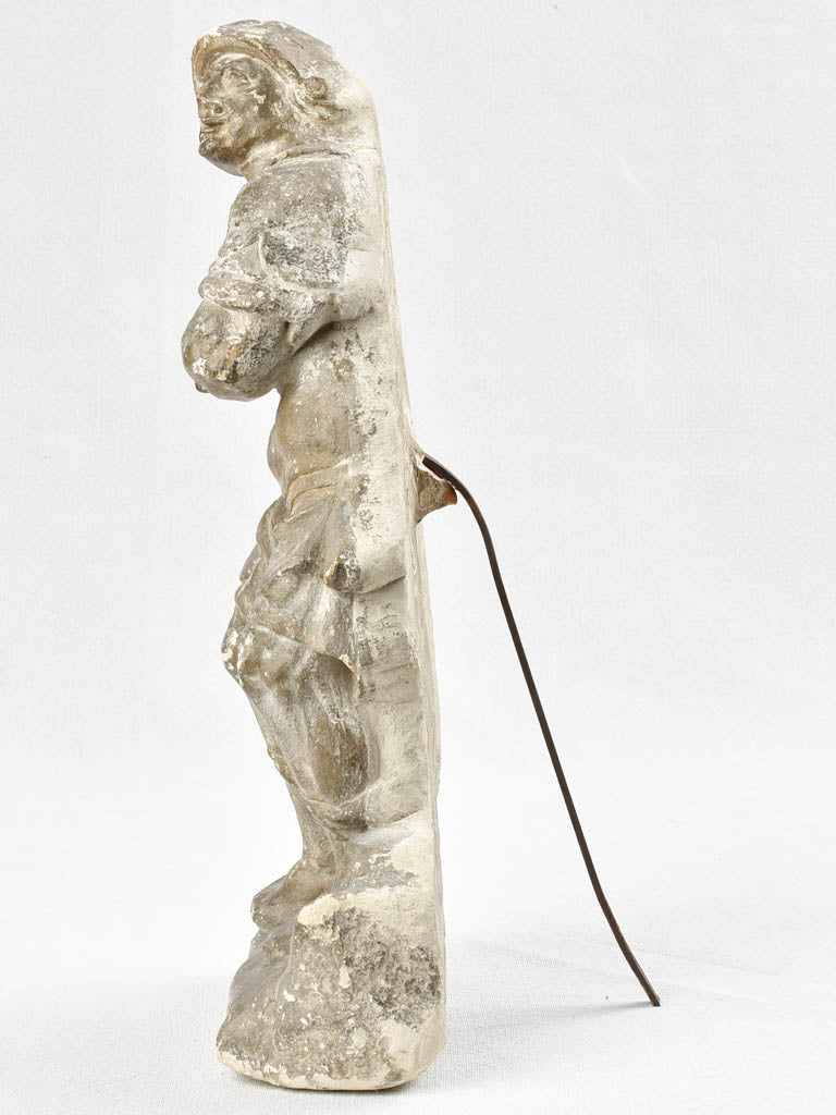 Missing-hand warrior, 17th century sculpture