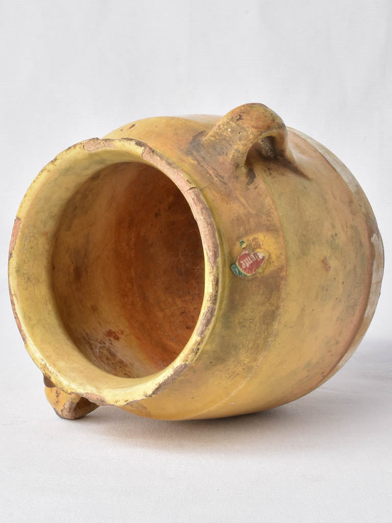 Preserve-filled antique yellow confit pot