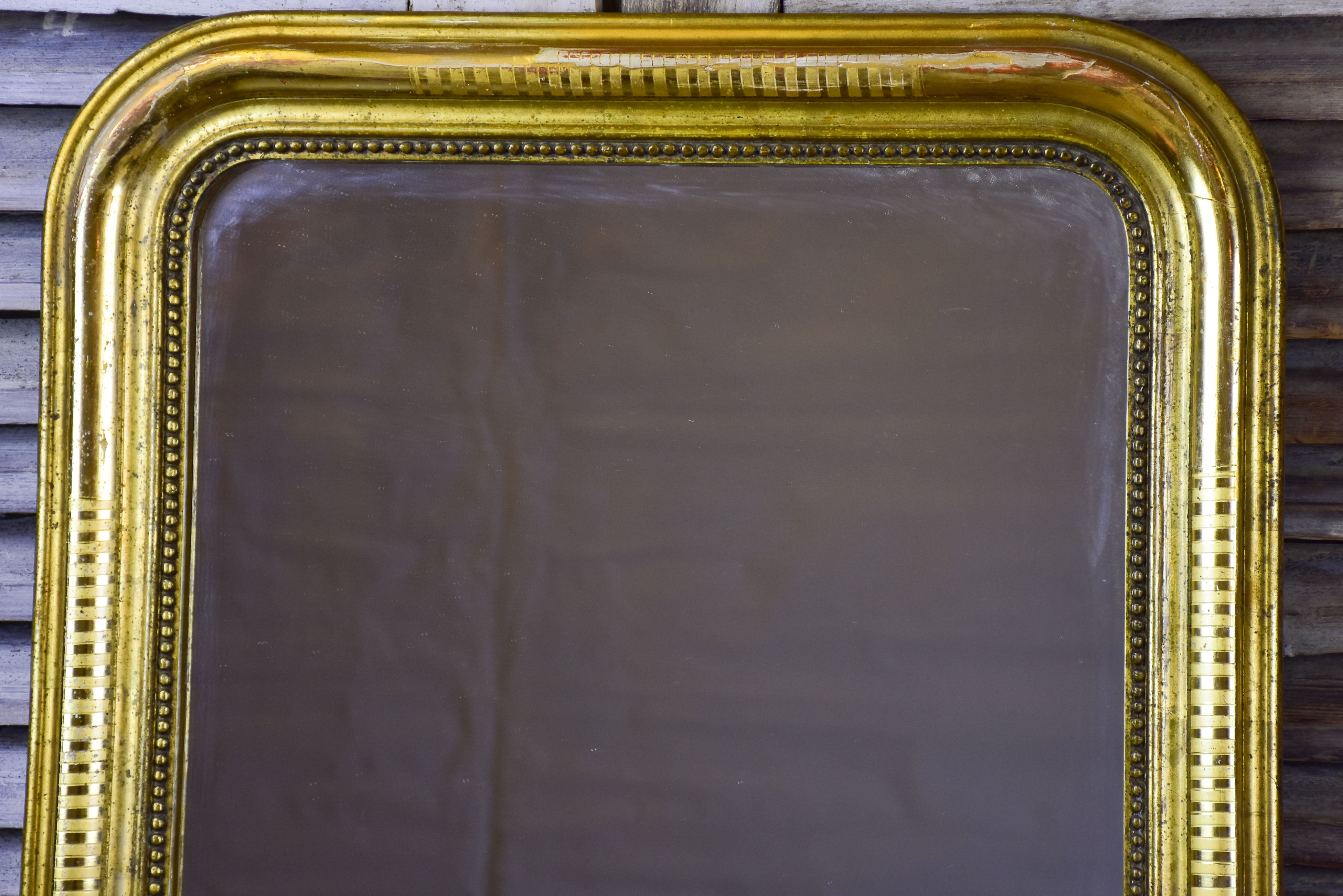 Antique French Louis Philippe mirror with gilded frame