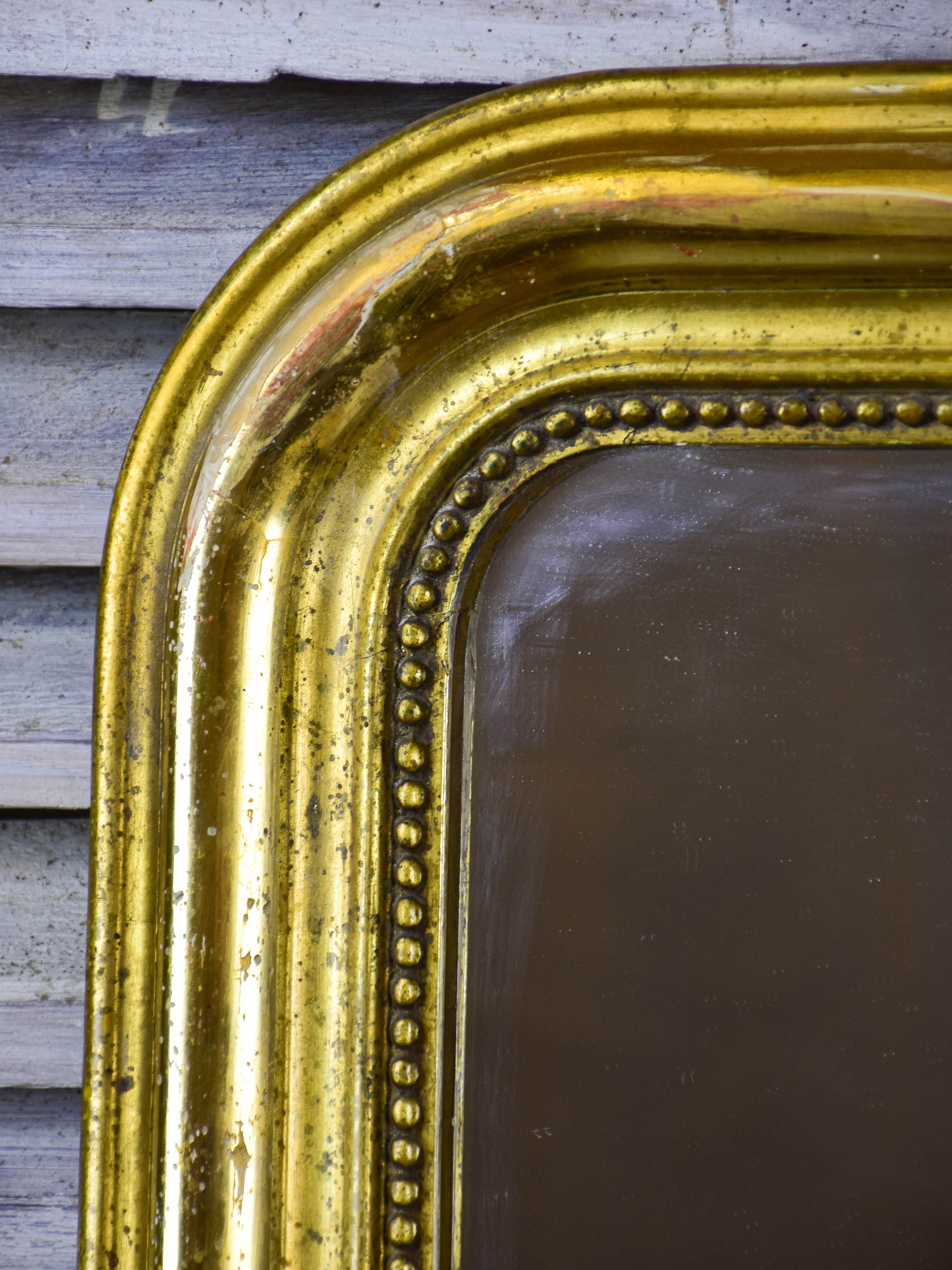 Antique French Louis Philippe mirror with gilded frame