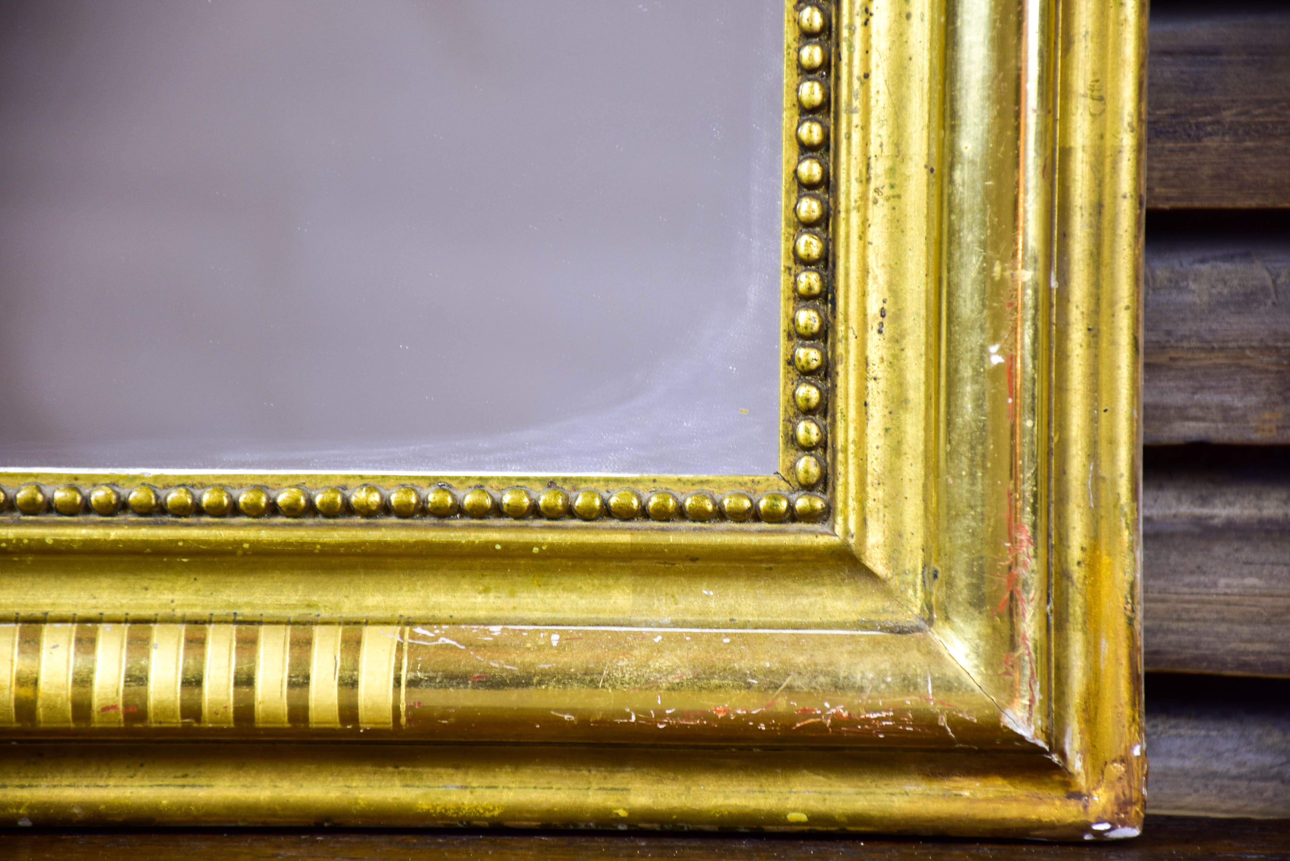 Antique French Louis Philippe mirror with gilded frame