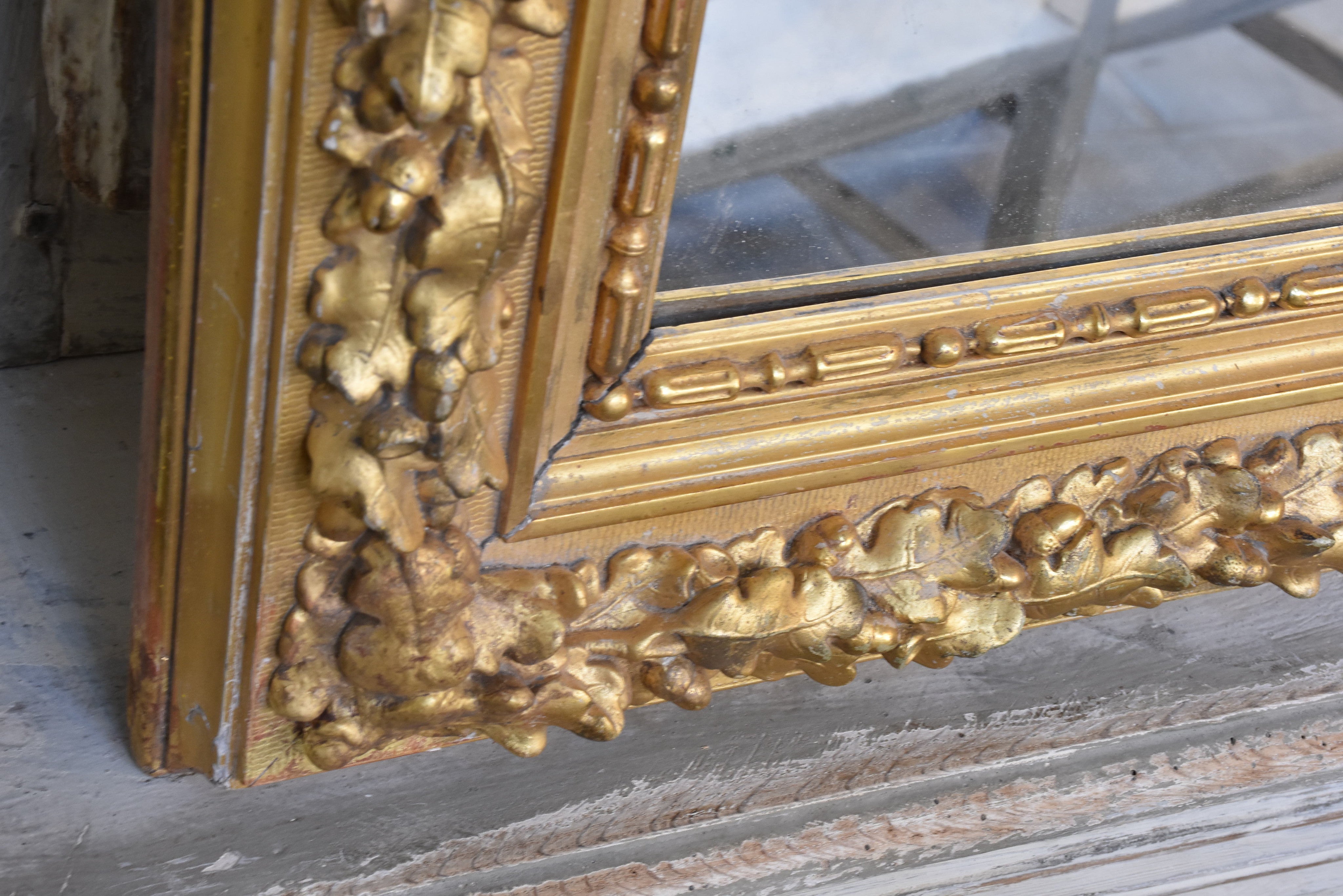 Mirror, large, gilded with decorative frame