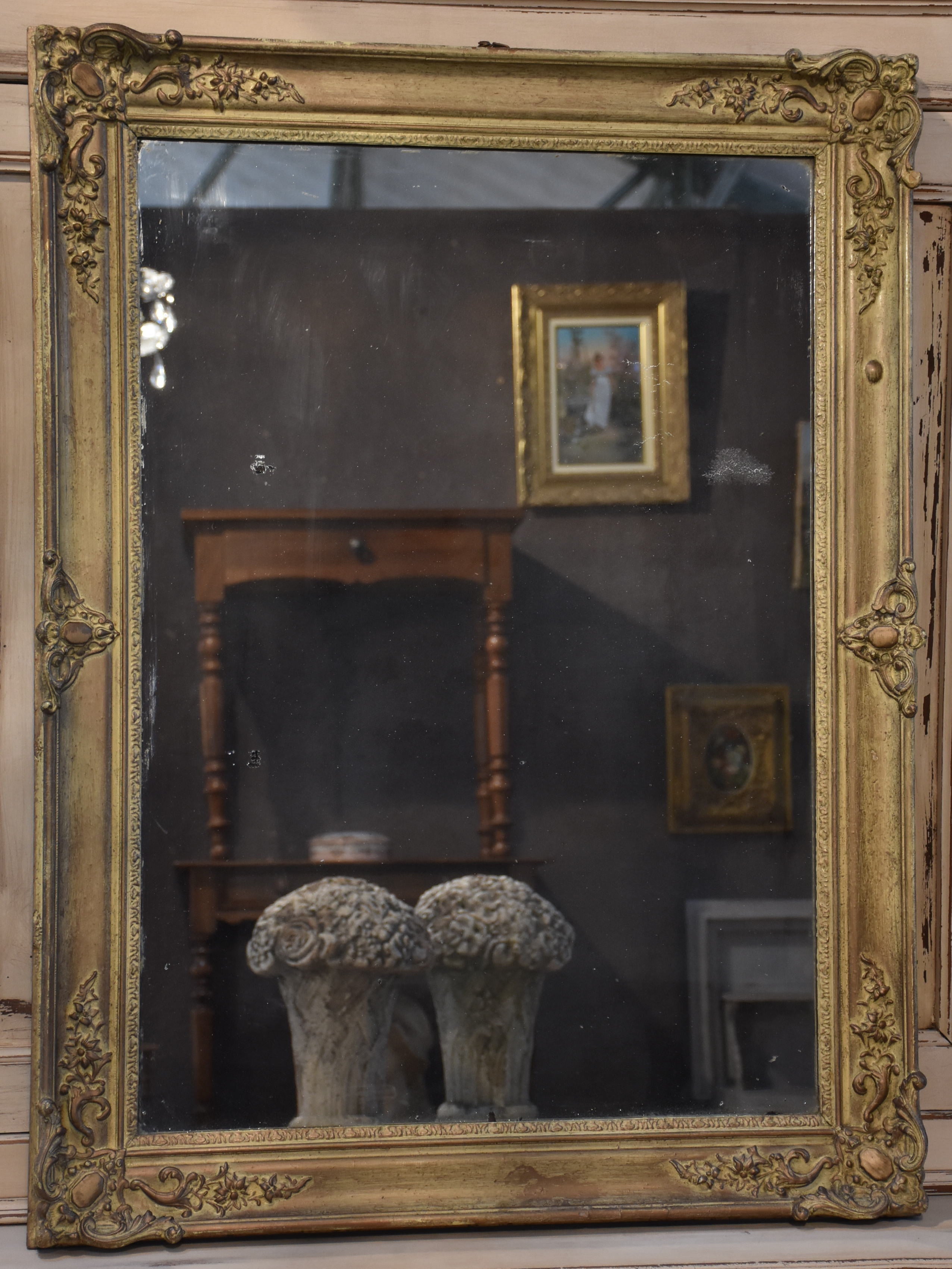 Antique French mirror with decorative frame