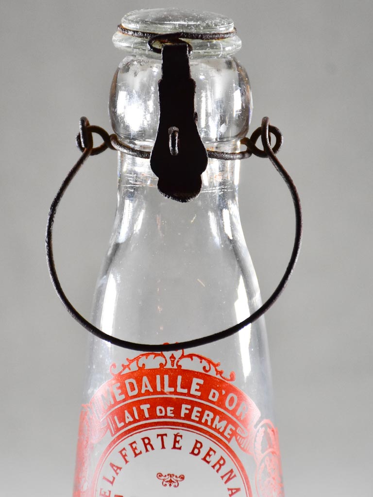 Antique French milk bottle with red transfer label 9¾"