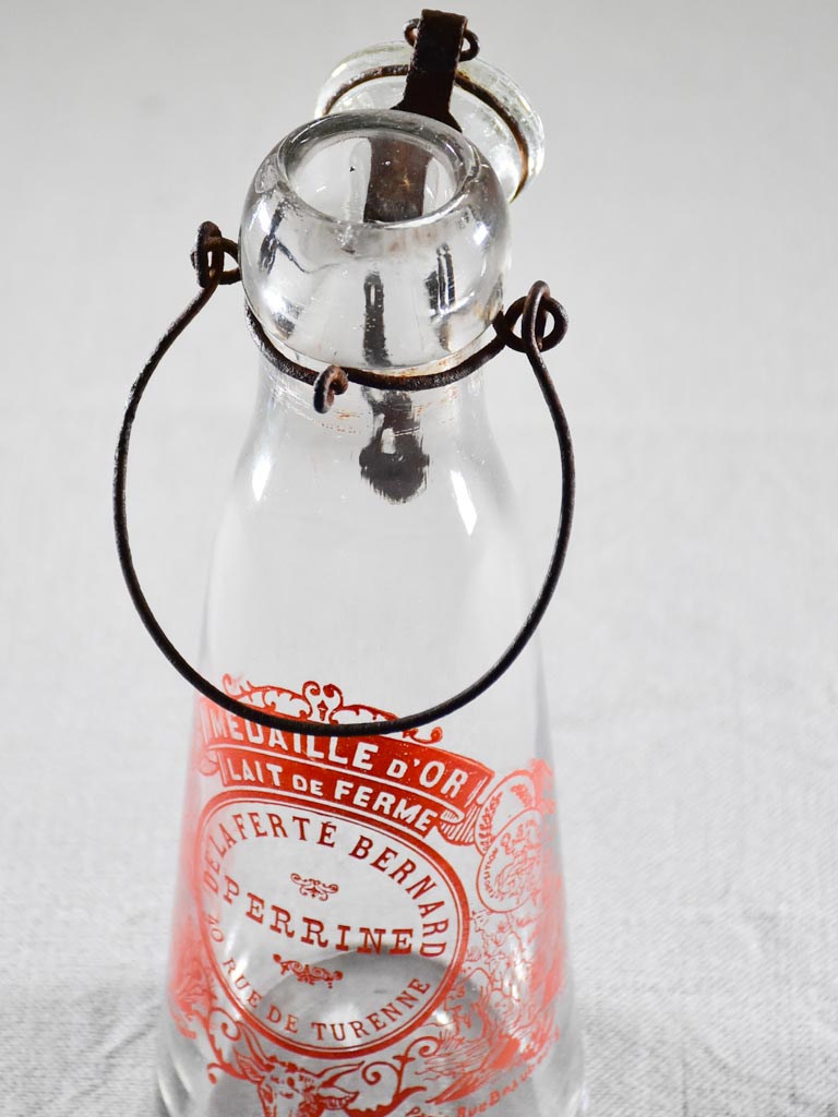 Antique French milk bottle with red transfer label 9¾"