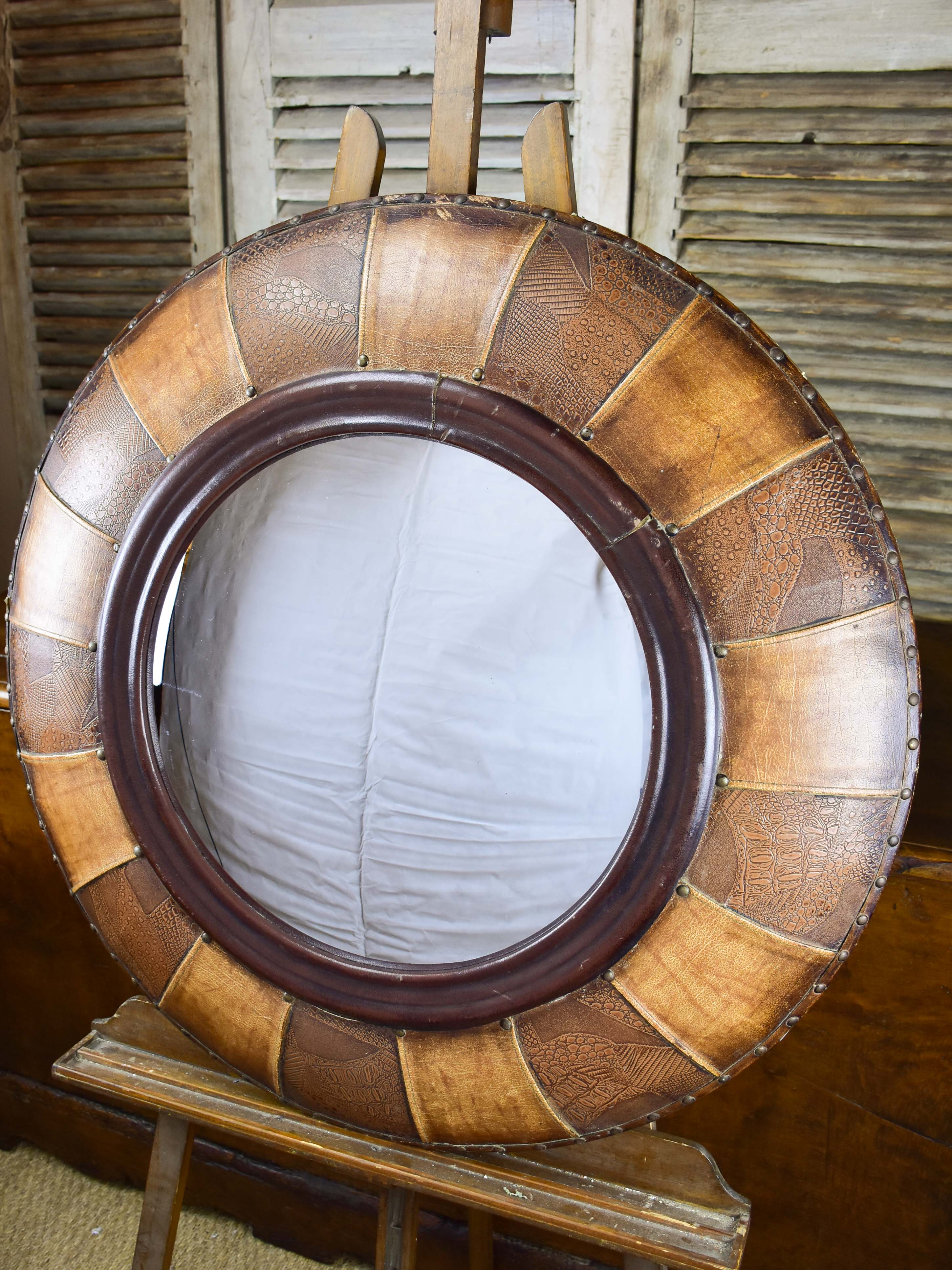 Very large round vintage mirror with leather frame 34 ¾'' diameter