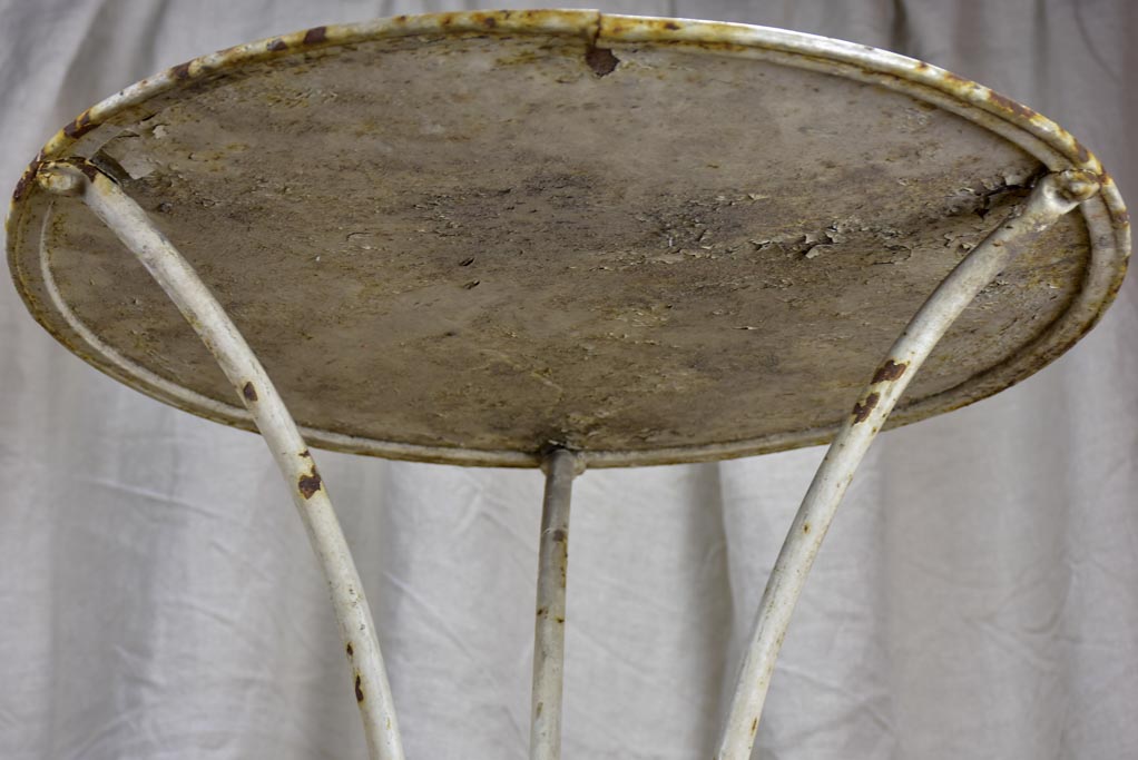 Antique French round iron garden tables