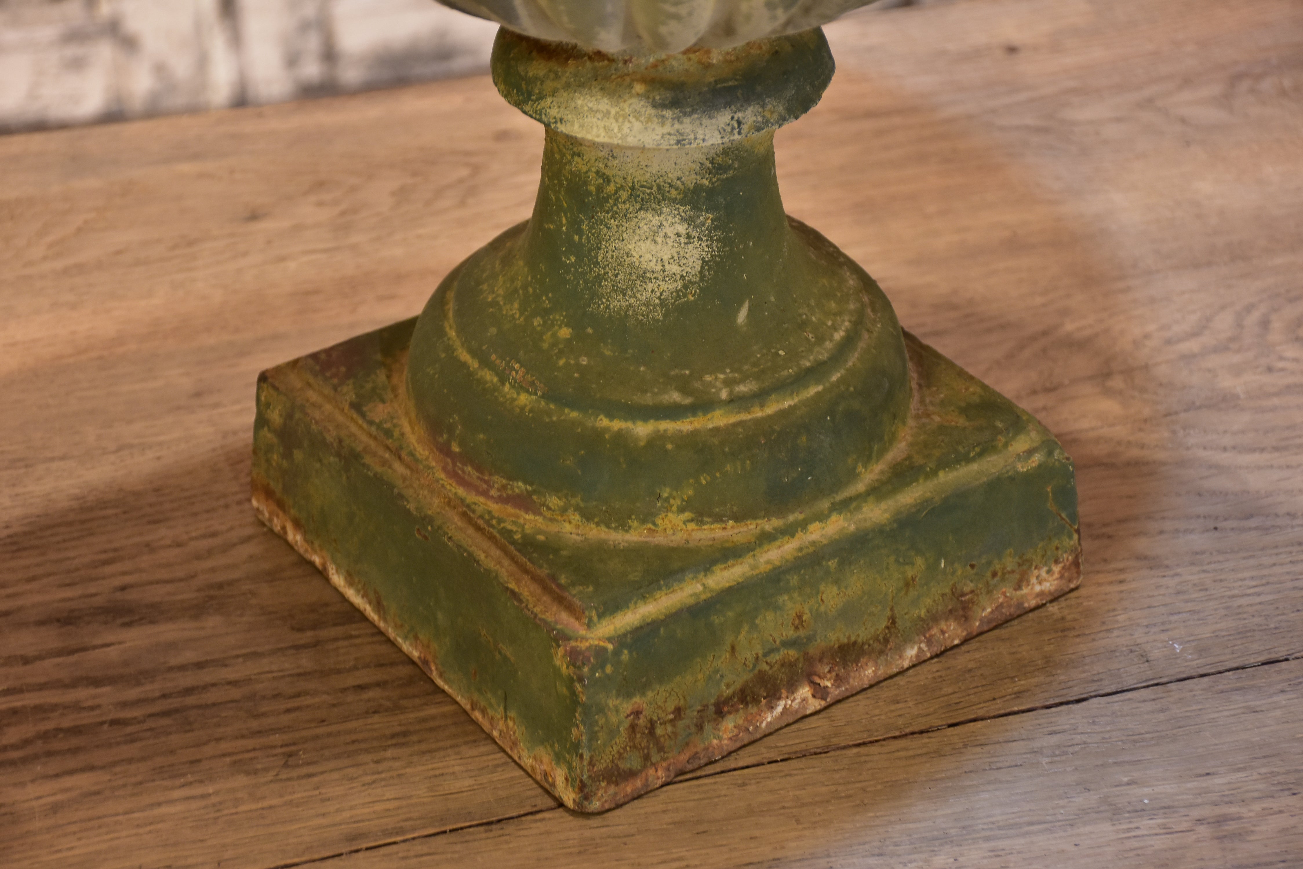 Late 19th century garden urn with angels and green patina