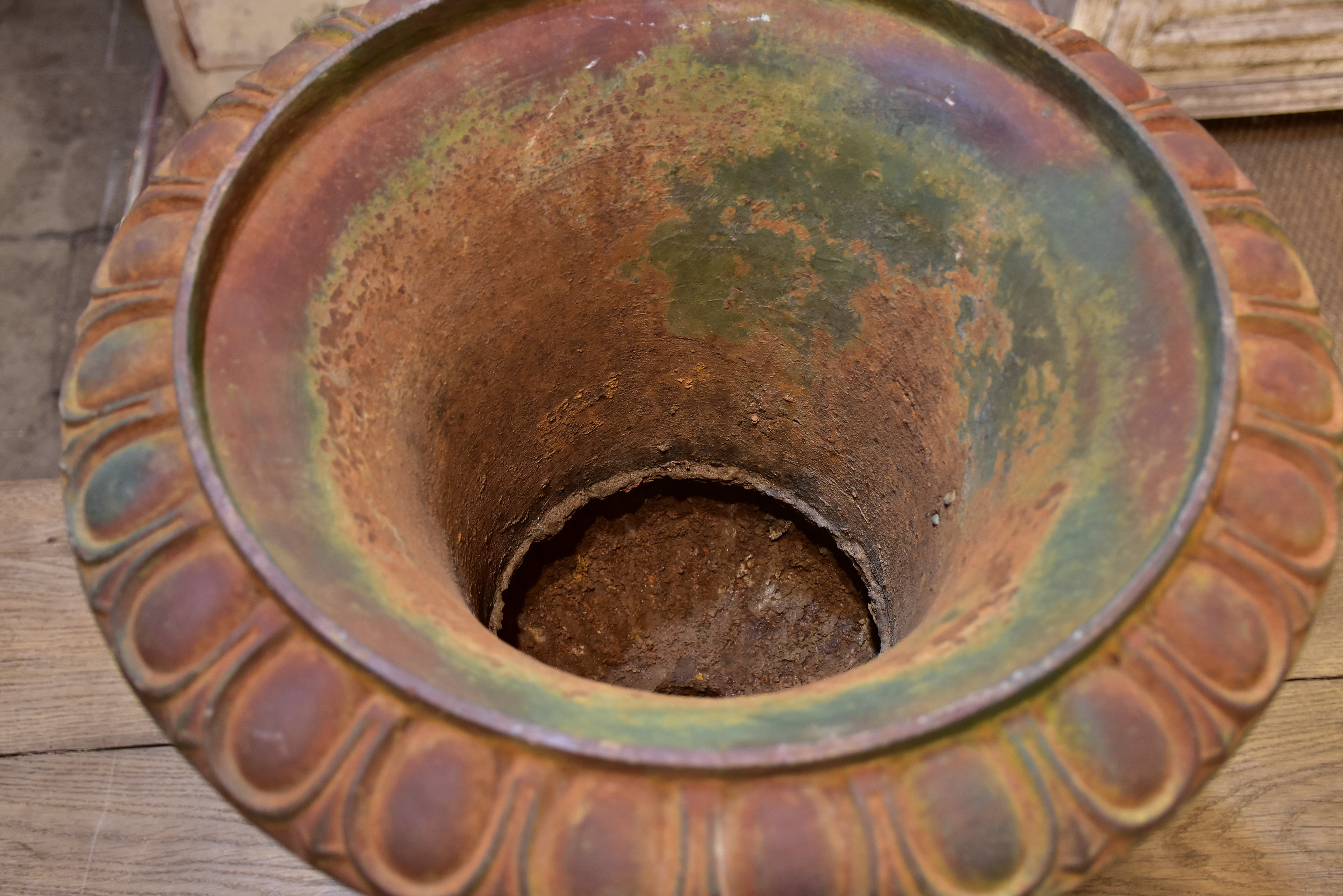 Late 19th century garden urn with angels and green patina