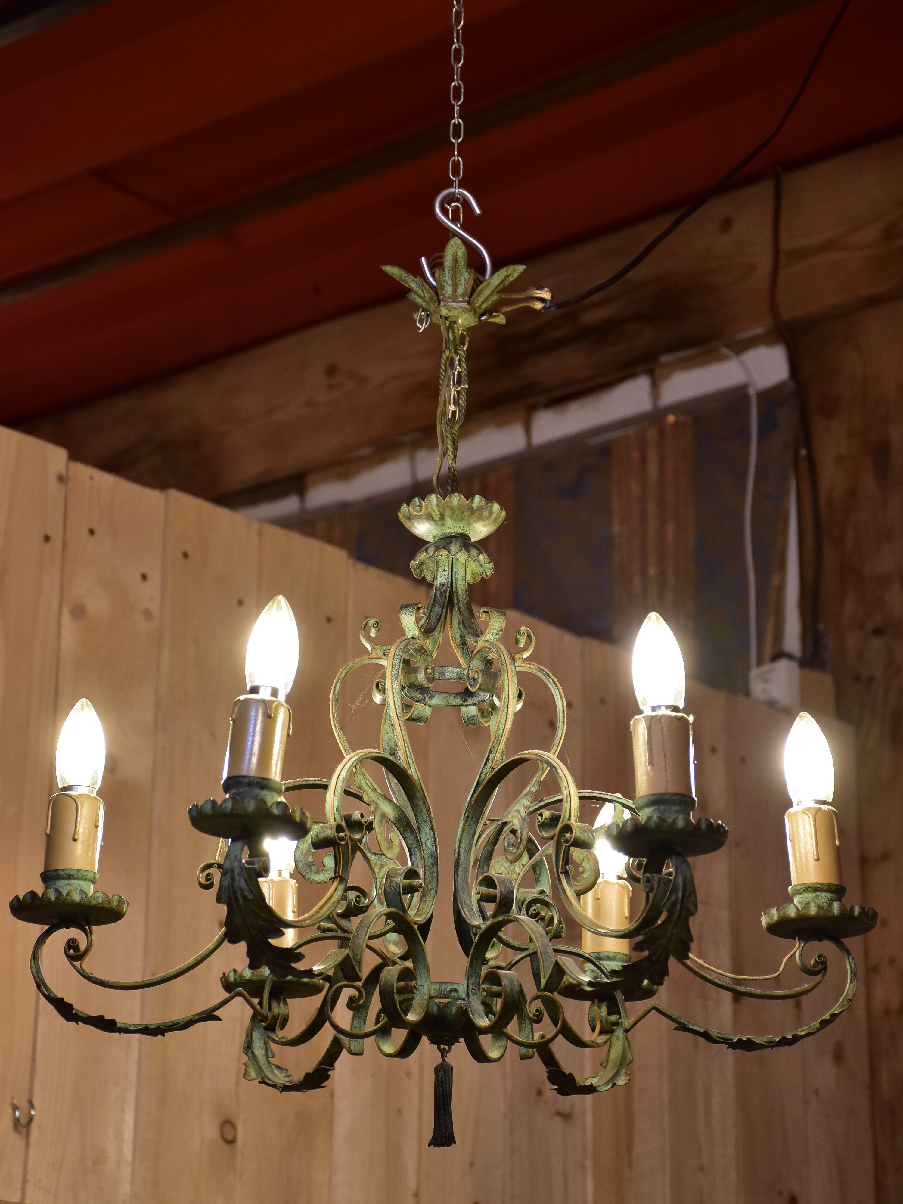 Antique French chandelier with green patina