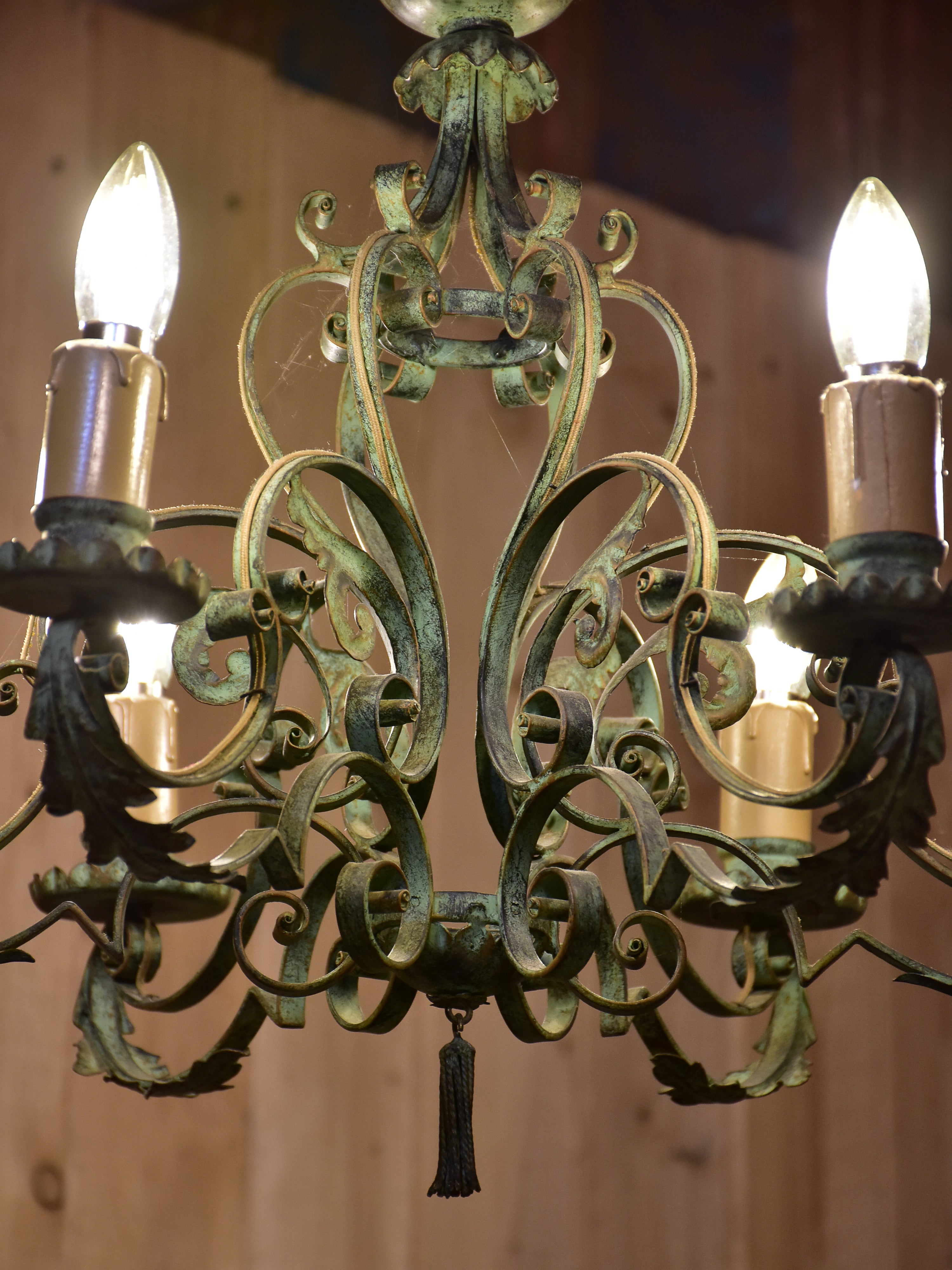 Antique French chandelier with green patina