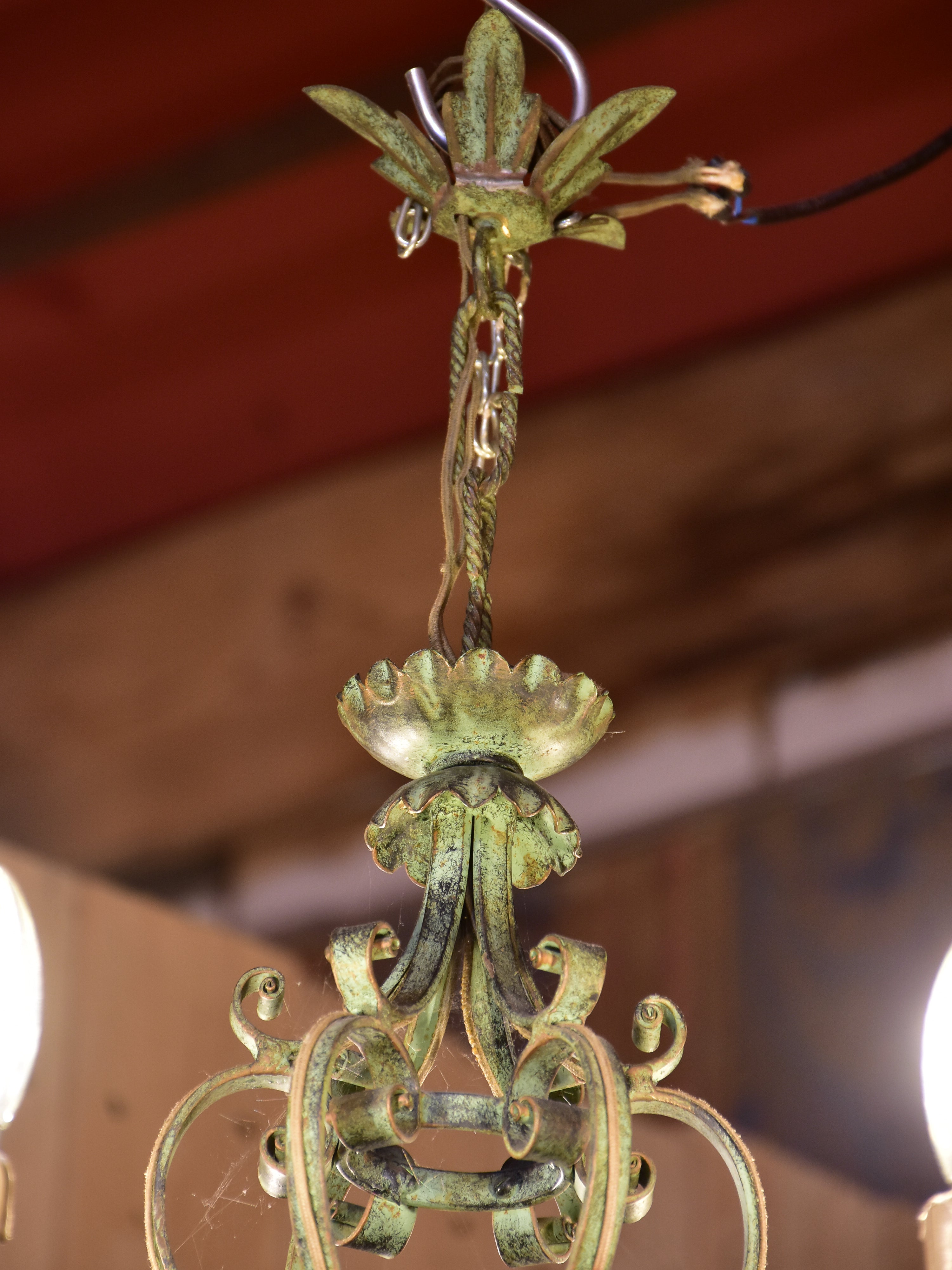 Antique French chandelier with green patina