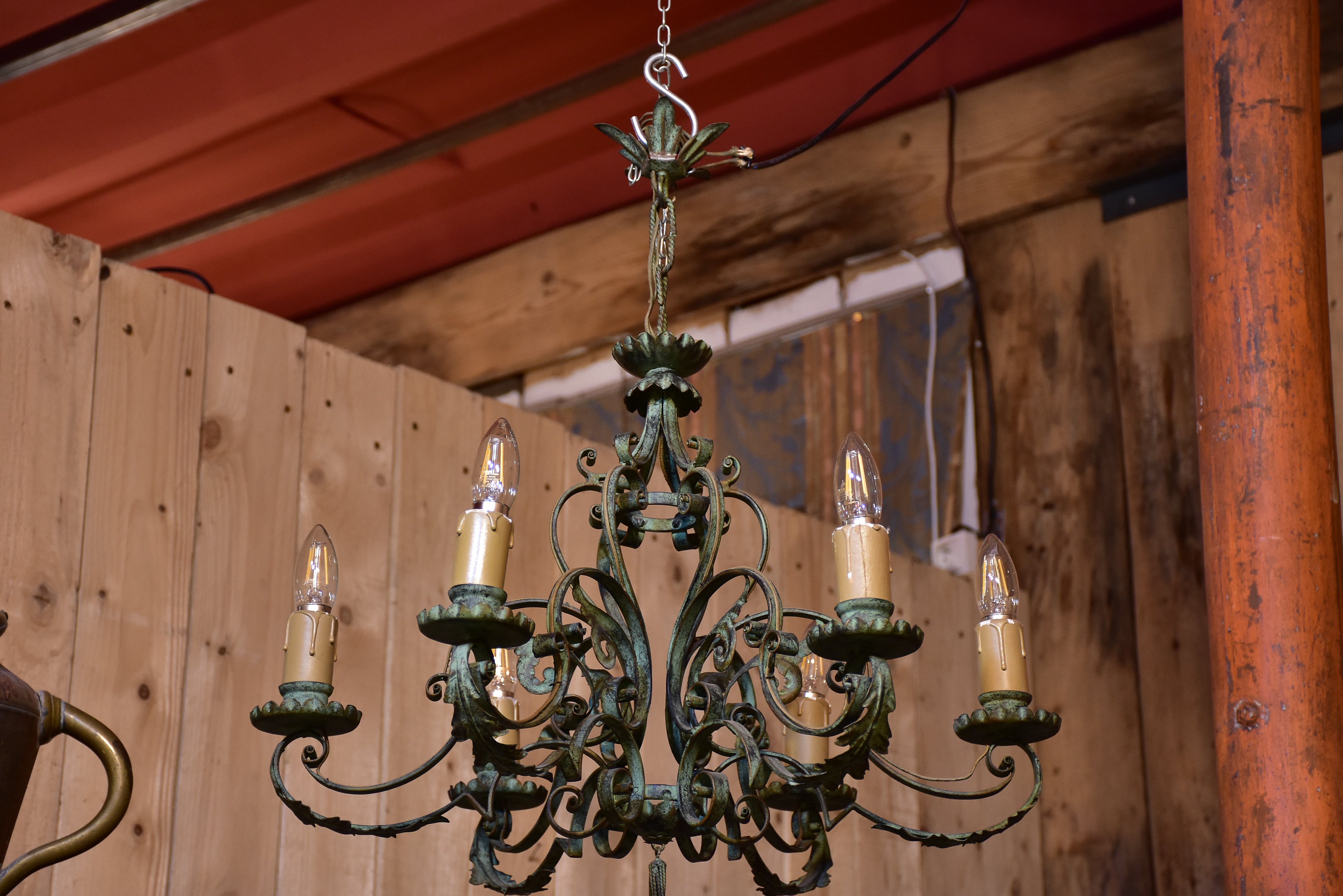 Antique French chandelier with green patina