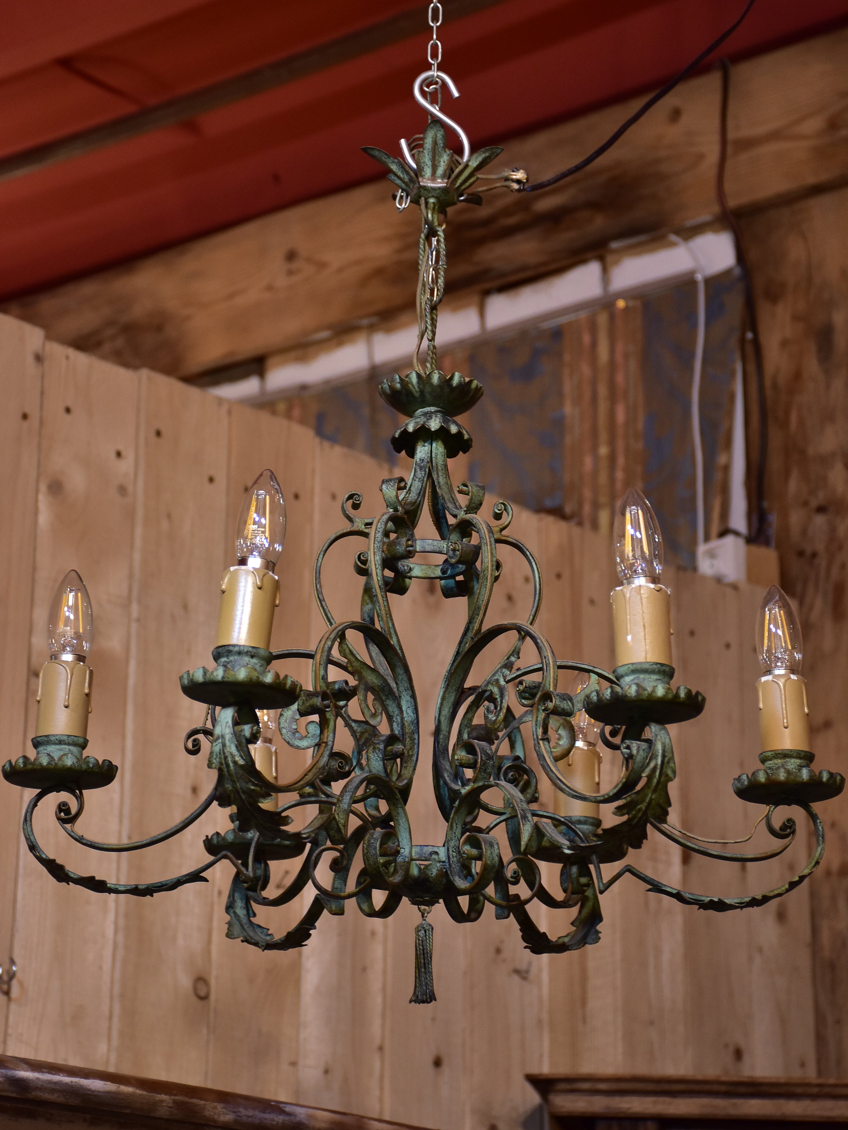 Antique French chandelier with green patina