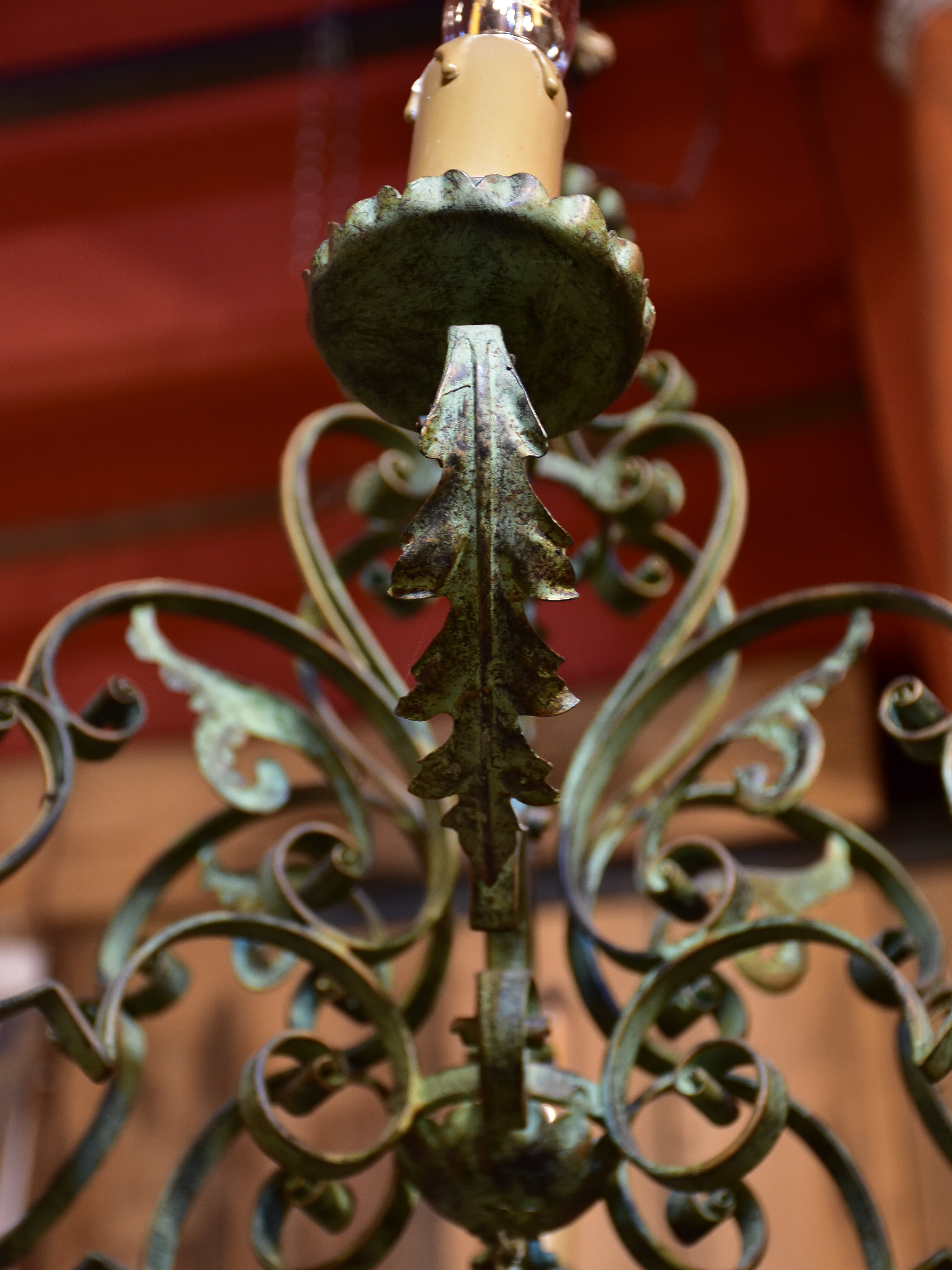 Antique French chandelier with green patina