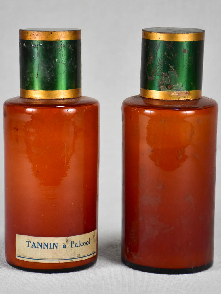 Two late nineteenth-century French apothecary jars with green tin lids 8"