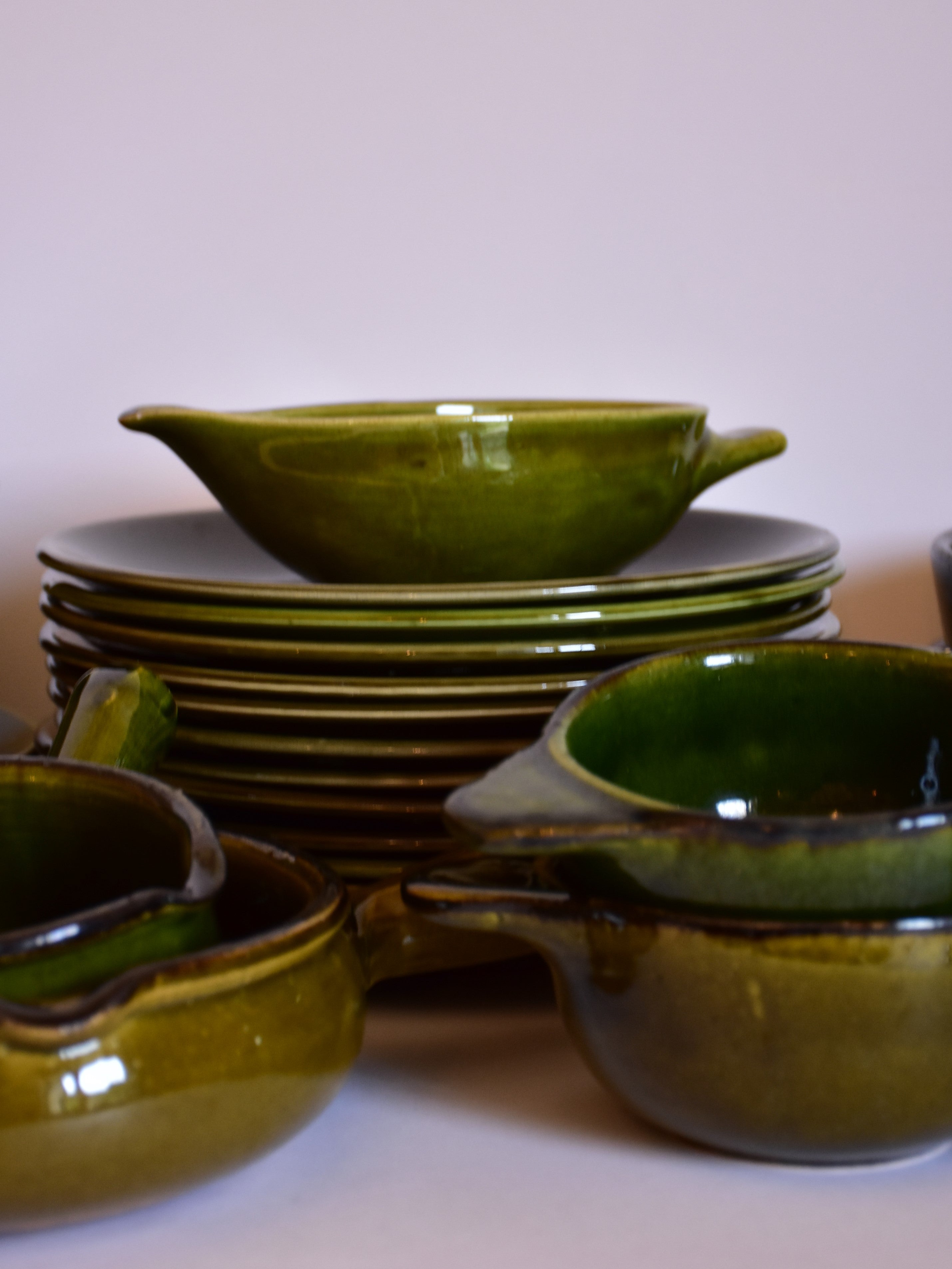 34 piece vintage French dinner service with green glaze